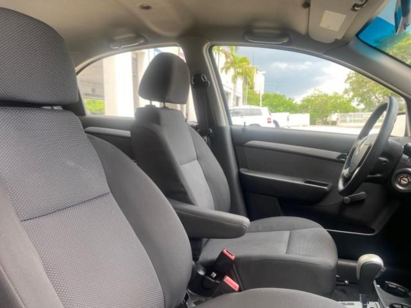 2011 Medium Gray /Charcoal Chevrolet Aveo LS LOW MILES 18,701 (KL1TD5DE5BB) with an Ecotec 1.6L DOHC 16-Valve 4-Cyl MFI Engine engine, Automatic transmission, located at 4701 North Dixie Hwy, Pompano Beach, FL, 33064, (954) 422-2889, 26.240938, -80.123474 - OUR WEBPAGE FLORIDACARS1.COM HAS OVER 100 PHOTOS AND FREE CARFAX LINK 2011 CHEVROLET AVEO LT VIN: KL1TD5DE5BB141987 K L 1 T D 5 D E 5 B B 1 4 1 9 8 7 SEDAN 4 DR 1.6L I4 F DOHC 16V GASOLINE 35 MPG FRONT WHEEL DRIVE Top Features Cloth Seats Basic Features AM/FM Stereo Automatic Transmission Cruise Con - Photo#88
