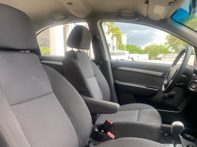 2011 Medium Gray /Charcoal Chevrolet Aveo LS LOW MILES 18,766 (KL1TD5DE5BB) with an Ecotec 1.6L DOHC 16-Valve 4-Cyl MFI Engine engine, Automatic transmission, located at 4701 North Dixie Hwy, Pompano Beach, FL, 33064, (954) 422-2889, 26.240938, -80.123474 - OUR WEBPAGE FLORIDACARS1.COM HAS OVER 100 PHOTOS AND FREE CARFAX LINK 2011 CHEVROLET AVEO LT VIN: KL1TD5DE5BB141987 K L 1 T D 5 D E 5 B B 1 4 1 9 8 7 SEDAN 4 DR 1.6L I4 F DOHC 16V GASOLINE 35 MPG FRONT WHEEL DRIVE Top Features Cloth Seats Basic Features AM/FM Stereo Automatic Transmission Cruise Con - Photo#88