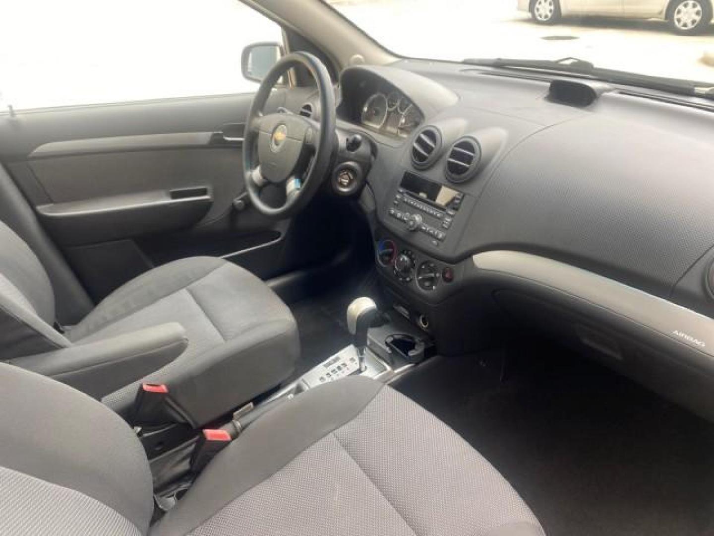 2011 Medium Gray /Charcoal Chevrolet Aveo LS LOW MILES 18,701 (KL1TD5DE5BB) with an Ecotec 1.6L DOHC 16-Valve 4-Cyl MFI Engine engine, Automatic transmission, located at 4701 North Dixie Hwy, Pompano Beach, FL, 33064, (954) 422-2889, 26.240938, -80.123474 - OUR WEBPAGE FLORIDACARS1.COM HAS OVER 100 PHOTOS AND FREE CARFAX LINK 2011 CHEVROLET AVEO LT VIN: KL1TD5DE5BB141987 K L 1 T D 5 D E 5 B B 1 4 1 9 8 7 SEDAN 4 DR 1.6L I4 F DOHC 16V GASOLINE 35 MPG FRONT WHEEL DRIVE Top Features Cloth Seats Basic Features AM/FM Stereo Automatic Transmission Cruise Con - Photo#90