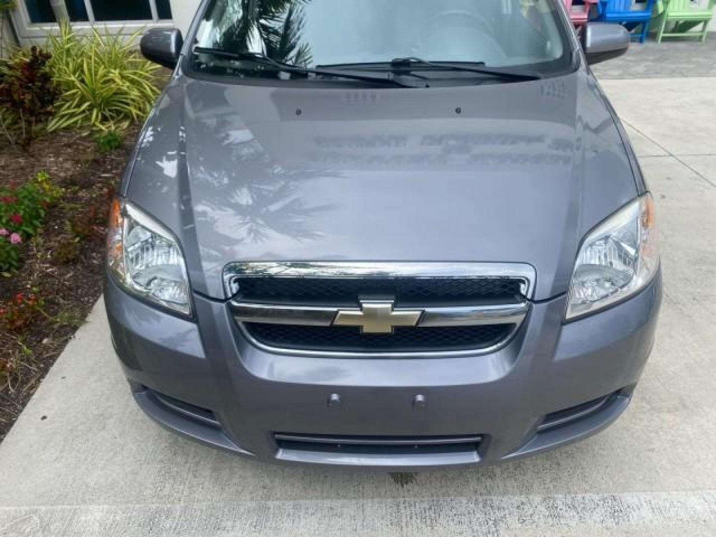 2011 Medium Gray /Charcoal Chevrolet Aveo LS LOW MILES 18,701 (KL1TD5DE5BB) with an Ecotec 1.6L DOHC 16-Valve 4-Cyl MFI Engine engine, Automatic transmission, located at 4701 North Dixie Hwy, Pompano Beach, FL, 33064, (954) 422-2889, 26.240938, -80.123474 - OUR WEBPAGE FLORIDACARS1.COM HAS OVER 100 PHOTOS AND FREE CARFAX LINK 2011 CHEVROLET AVEO LT VIN: KL1TD5DE5BB141987 K L 1 T D 5 D E 5 B B 1 4 1 9 8 7 SEDAN 4 DR 1.6L I4 F DOHC 16V GASOLINE 35 MPG FRONT WHEEL DRIVE Top Features Cloth Seats Basic Features AM/FM Stereo Automatic Transmission Cruise Con - Photo#98
