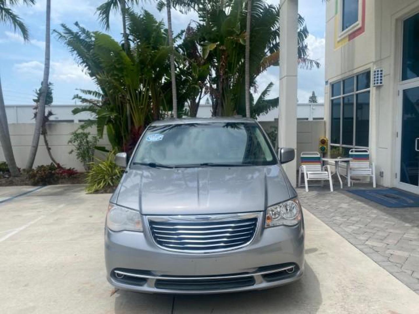 2014 Billet Silver Metallic Clearcoat /Black/Light Graystone Chrysler Town and Country Touring LOW MILES ONLY 46.298 (2C4RC1BG3ER) with an 3.6L V6 Cylinder Engine engine, Automatic transmission, located at 4701 North Dixie Hwy, Pompano Beach, FL, 33064, (954) 422-2889, 26.240938, -80.123474 - OUR WEBPAGE FLORIDACARS1.COM HAS OVER 100 PHOTOS AND FREE CARFAX LINK 2014 CHRYSLER TOWN AND COUNTRY TOURING VIN: 2C4RC1BG3ER206943 2 C 4 R C 1 B G 3 E R 2 0 6 9 4 3 VAN 3.6L V6 F DOHC 24V GASOLINE FRONT WHEEL DRIVE Top Features Alloy Wheels Rear Air Conditioning Bluetooth Technology Rear Entertainm - Photo#2