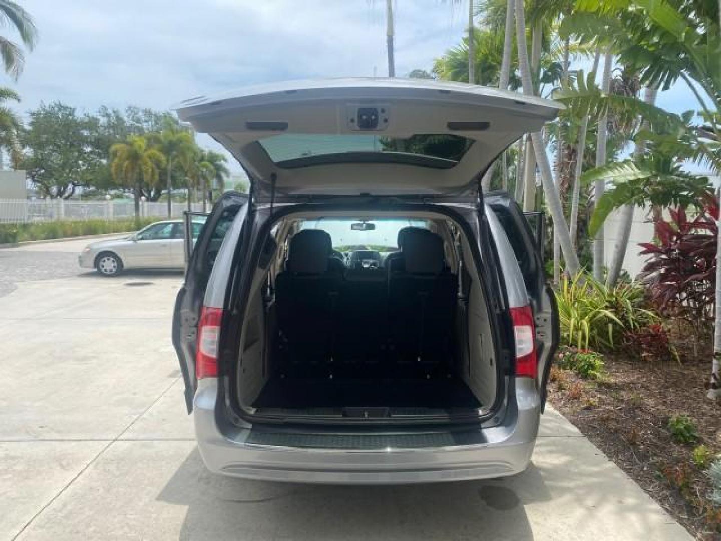 2014 Billet Silver Metallic Clearcoat /Black/Light Graystone Chrysler Town and Country Touring LOW MILES ONLY 46.298 (2C4RC1BG3ER) with an 3.6L V6 Cylinder Engine engine, Automatic transmission, located at 4701 North Dixie Hwy, Pompano Beach, FL, 33064, (954) 422-2889, 26.240938, -80.123474 - OUR WEBPAGE FLORIDACARS1.COM HAS OVER 100 PHOTOS AND FREE CARFAX LINK 2014 CHRYSLER TOWN AND COUNTRY TOURING VIN: 2C4RC1BG3ER206943 2 C 4 R C 1 B G 3 E R 2 0 6 9 4 3 VAN 3.6L V6 F DOHC 24V GASOLINE FRONT WHEEL DRIVE Top Features Alloy Wheels Rear Air Conditioning Bluetooth Technology Rear Entertainm - Photo#15