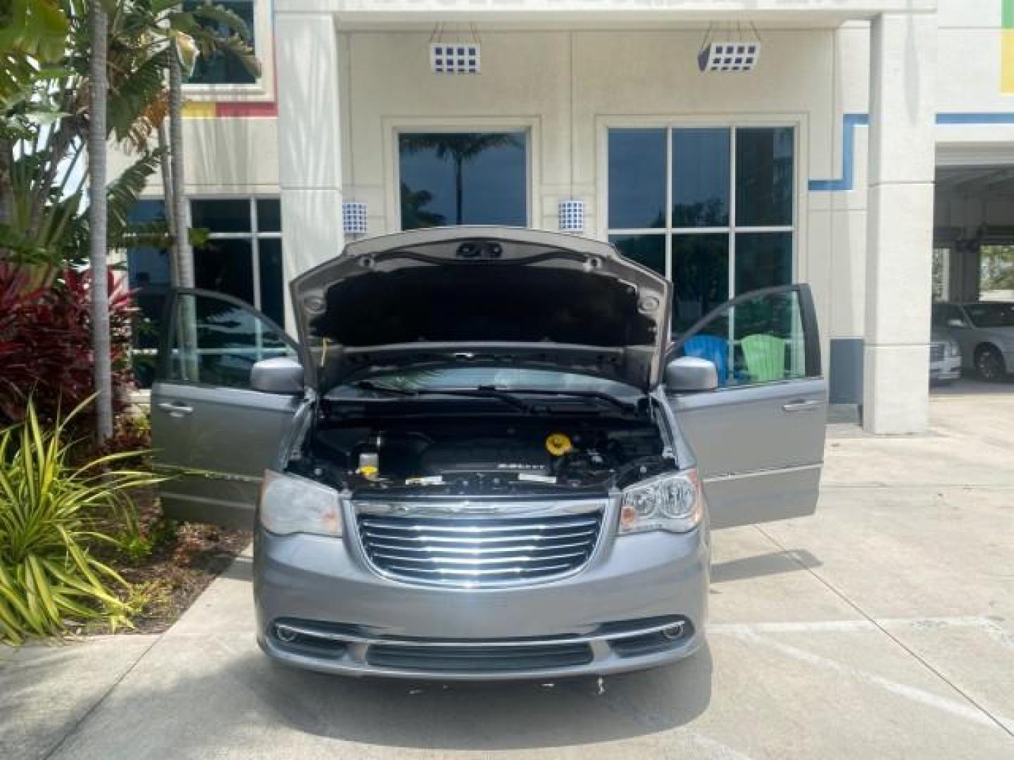 2014 Billet Silver Metallic Clearcoat /Black/Light Graystone Chrysler Town and Country Touring LOW MILES ONLY 46.298 (2C4RC1BG3ER) with an 3.6L V6 Cylinder Engine engine, Automatic transmission, located at 4701 North Dixie Hwy, Pompano Beach, FL, 33064, (954) 422-2889, 26.240938, -80.123474 - OUR WEBPAGE FLORIDACARS1.COM HAS OVER 100 PHOTOS AND FREE CARFAX LINK 2014 CHRYSLER TOWN AND COUNTRY TOURING VIN: 2C4RC1BG3ER206943 2 C 4 R C 1 B G 3 E R 2 0 6 9 4 3 VAN 3.6L V6 F DOHC 24V GASOLINE FRONT WHEEL DRIVE Top Features Alloy Wheels Rear Air Conditioning Bluetooth Technology Rear Entertainm - Photo#16