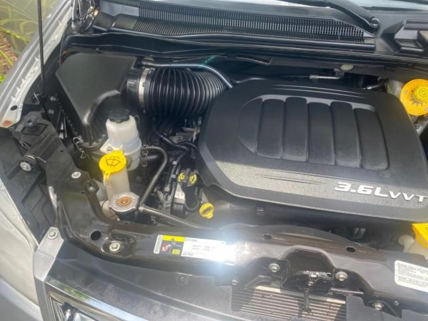 2014 Billet Silver Metallic Clearcoat /Black/Light Graystone Chrysler Town and Country Touring LOW MILES ONLY 46.298 (2C4RC1BG3ER) with an 3.6L V6 Cylinder Engine engine, Automatic transmission, located at 4701 North Dixie Hwy, Pompano Beach, FL, 33064, (954) 422-2889, 26.240938, -80.123474 - OUR WEBPAGE FLORIDACARS1.COM HAS OVER 100 PHOTOS AND FREE CARFAX LINK 2014 CHRYSLER TOWN AND COUNTRY TOURING VIN: 2C4RC1BG3ER206943 2 C 4 R C 1 B G 3 E R 2 0 6 9 4 3 VAN 3.6L V6 F DOHC 24V GASOLINE FRONT WHEEL DRIVE Top Features Alloy Wheels Rear Air Conditioning Bluetooth Technology Rear Entertainm - Photo#25