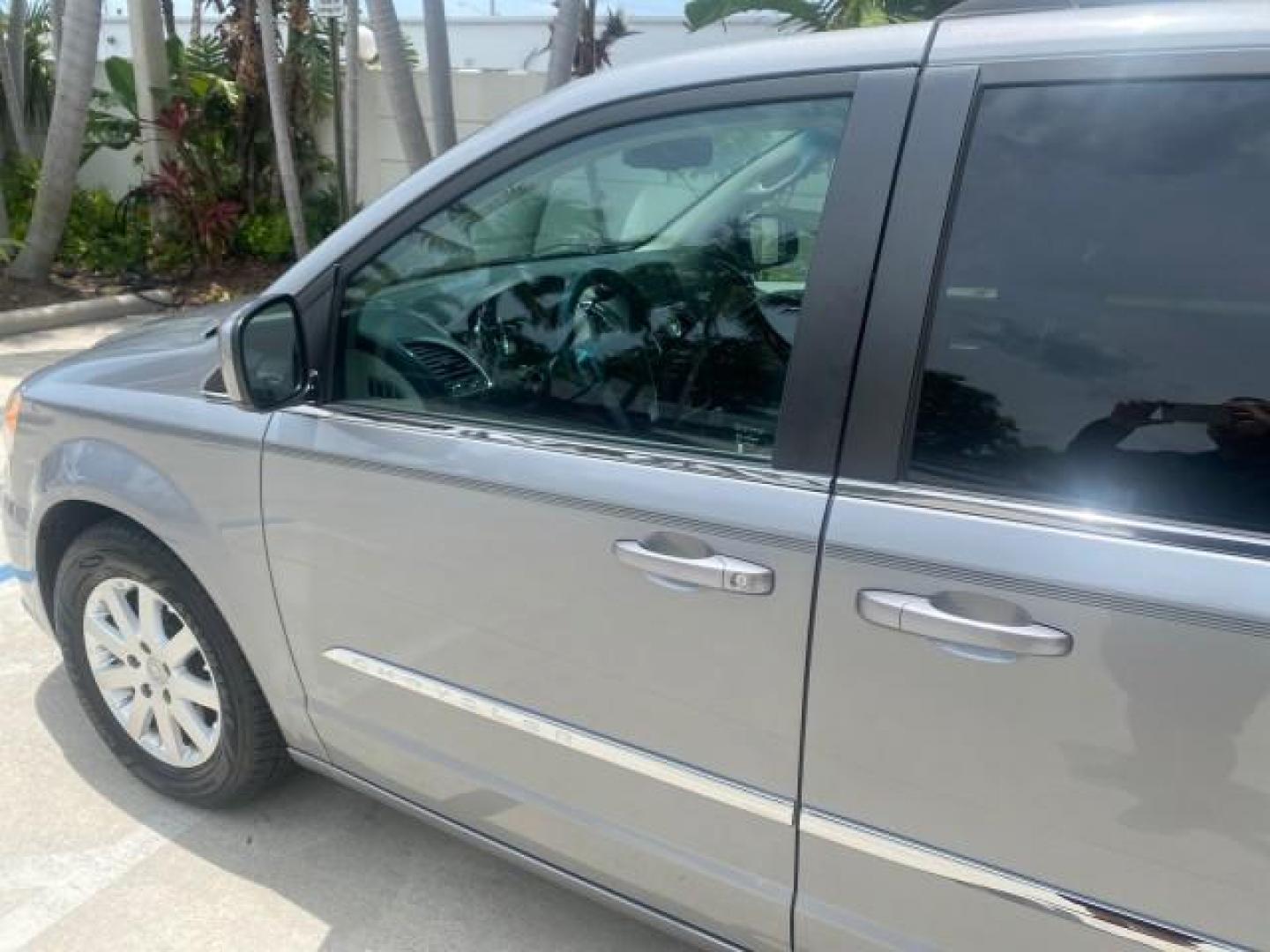 2014 Billet Silver Metallic Clearcoat /Black/Light Graystone Chrysler Town and Country Touring LOW MILES ONLY 46.298 (2C4RC1BG3ER) with an 3.6L V6 Cylinder Engine engine, Automatic transmission, located at 4701 North Dixie Hwy, Pompano Beach, FL, 33064, (954) 422-2889, 26.240938, -80.123474 - OUR WEBPAGE FLORIDACARS1.COM HAS OVER 100 PHOTOS AND FREE CARFAX LINK 2014 CHRYSLER TOWN AND COUNTRY TOURING VIN: 2C4RC1BG3ER206943 2 C 4 R C 1 B G 3 E R 2 0 6 9 4 3 VAN 3.6L V6 F DOHC 24V GASOLINE FRONT WHEEL DRIVE Top Features Alloy Wheels Rear Air Conditioning Bluetooth Technology Rear Entertainm - Photo#27