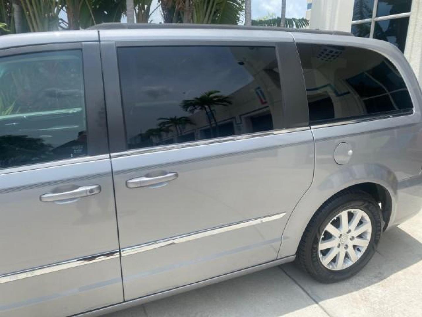 2014 Billet Silver Metallic Clearcoat /Black/Light Graystone Chrysler Town and Country Touring LOW MILES ONLY 46.298 (2C4RC1BG3ER) with an 3.6L V6 Cylinder Engine engine, Automatic transmission, located at 4701 North Dixie Hwy, Pompano Beach, FL, 33064, (954) 422-2889, 26.240938, -80.123474 - OUR WEBPAGE FLORIDACARS1.COM HAS OVER 100 PHOTOS AND FREE CARFAX LINK 2014 CHRYSLER TOWN AND COUNTRY TOURING VIN: 2C4RC1BG3ER206943 2 C 4 R C 1 B G 3 E R 2 0 6 9 4 3 VAN 3.6L V6 F DOHC 24V GASOLINE FRONT WHEEL DRIVE Top Features Alloy Wheels Rear Air Conditioning Bluetooth Technology Rear Entertainm - Photo#56