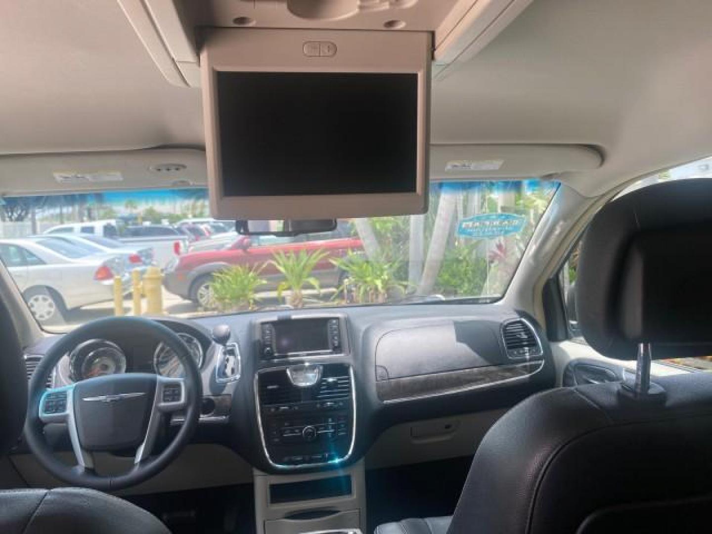 2014 Billet Silver Metallic Clearcoat /Black/Light Graystone Chrysler Town and Country Touring LOW MILES ONLY 46.298 (2C4RC1BG3ER) with an 3.6L V6 Cylinder Engine engine, Automatic transmission, located at 4701 North Dixie Hwy, Pompano Beach, FL, 33064, (954) 422-2889, 26.240938, -80.123474 - OUR WEBPAGE FLORIDACARS1.COM HAS OVER 100 PHOTOS AND FREE CARFAX LINK 2014 CHRYSLER TOWN AND COUNTRY TOURING VIN: 2C4RC1BG3ER206943 2 C 4 R C 1 B G 3 E R 2 0 6 9 4 3 VAN 3.6L V6 F DOHC 24V GASOLINE FRONT WHEEL DRIVE Top Features Alloy Wheels Rear Air Conditioning Bluetooth Technology Rear Entertainm - Photo#62