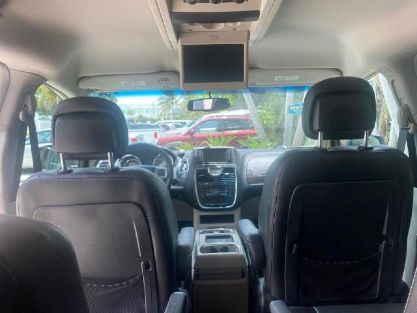 2014 Billet Silver Metallic Clearcoat /Black/Light Graystone Chrysler Town and Country Touring LOW MILES ONLY 46.298 (2C4RC1BG3ER) with an 3.6L V6 Cylinder Engine engine, Automatic transmission, located at 4701 North Dixie Hwy, Pompano Beach, FL, 33064, (954) 422-2889, 26.240938, -80.123474 - OUR WEBPAGE FLORIDACARS1.COM HAS OVER 100 PHOTOS AND FREE CARFAX LINK 2014 CHRYSLER TOWN AND COUNTRY TOURING VIN: 2C4RC1BG3ER206943 2 C 4 R C 1 B G 3 E R 2 0 6 9 4 3 VAN 3.6L V6 F DOHC 24V GASOLINE FRONT WHEEL DRIVE Top Features Alloy Wheels Rear Air Conditioning Bluetooth Technology Rear Entertainm - Photo#70