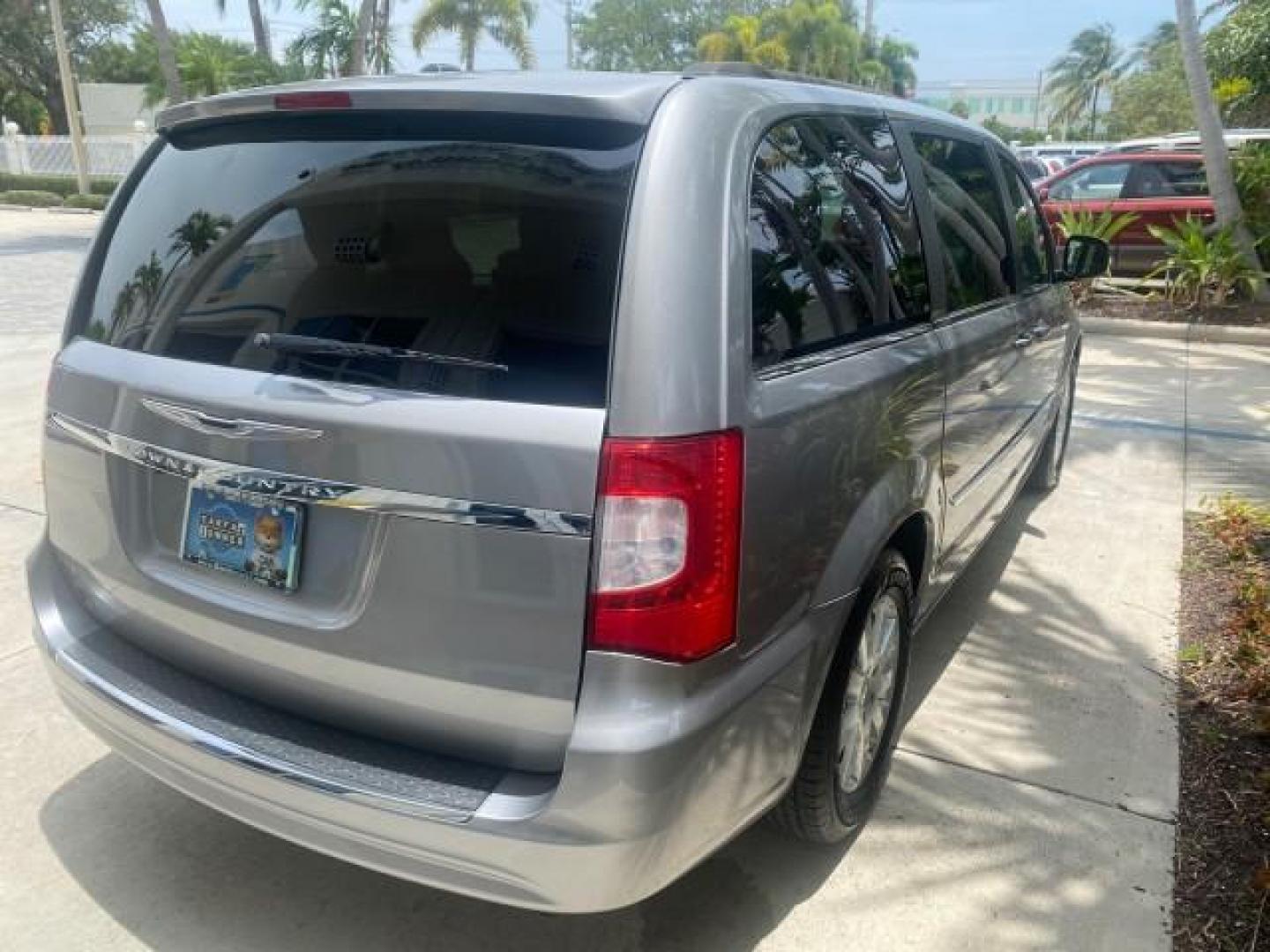 2014 Billet Silver Metallic Clearcoat /Black/Light Graystone Chrysler Town and Country Touring LOW MILES ONLY 46.298 (2C4RC1BG3ER) with an 3.6L V6 Cylinder Engine engine, Automatic transmission, located at 4701 North Dixie Hwy, Pompano Beach, FL, 33064, (954) 422-2889, 26.240938, -80.123474 - OUR WEBPAGE FLORIDACARS1.COM HAS OVER 100 PHOTOS AND FREE CARFAX LINK 2014 CHRYSLER TOWN AND COUNTRY TOURING VIN: 2C4RC1BG3ER206943 2 C 4 R C 1 B G 3 E R 2 0 6 9 4 3 VAN 3.6L V6 F DOHC 24V GASOLINE FRONT WHEEL DRIVE Top Features Alloy Wheels Rear Air Conditioning Bluetooth Technology Rear Entertainm - Photo#77