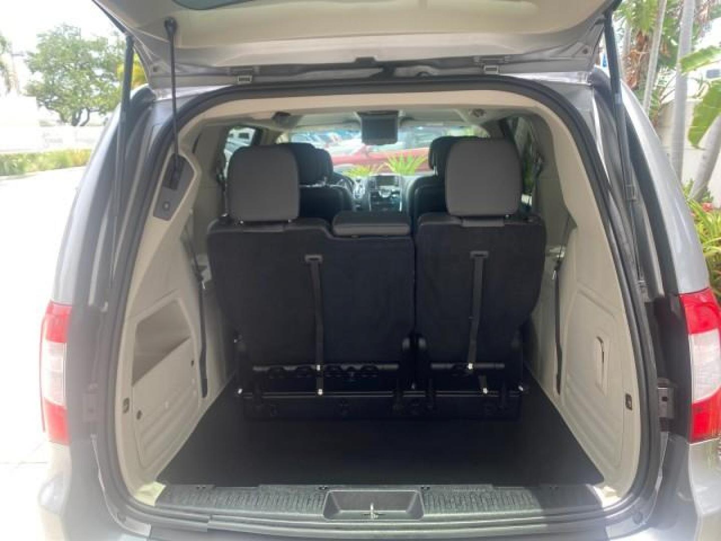 2014 Billet Silver Metallic Clearcoat /Black/Light Graystone Chrysler Town and Country Touring LOW MILES ONLY 46.298 (2C4RC1BG3ER) with an 3.6L V6 Cylinder Engine engine, Automatic transmission, located at 4701 North Dixie Hwy, Pompano Beach, FL, 33064, (954) 422-2889, 26.240938, -80.123474 - OUR WEBPAGE FLORIDACARS1.COM HAS OVER 100 PHOTOS AND FREE CARFAX LINK 2014 CHRYSLER TOWN AND COUNTRY TOURING VIN: 2C4RC1BG3ER206943 2 C 4 R C 1 B G 3 E R 2 0 6 9 4 3 VAN 3.6L V6 F DOHC 24V GASOLINE FRONT WHEEL DRIVE Top Features Alloy Wheels Rear Air Conditioning Bluetooth Technology Rear Entertainm - Photo#79