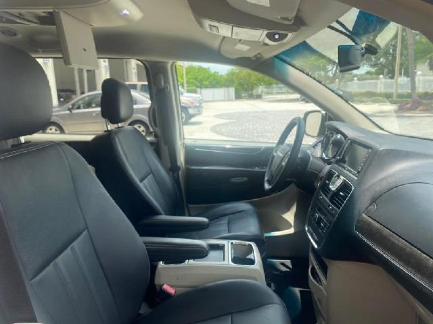 2014 Billet Silver Metallic Clearcoat /Black/Light Graystone Chrysler Town and Country Touring LOW MILES ONLY 46.298 (2C4RC1BG3ER) with an 3.6L V6 Cylinder Engine engine, Automatic transmission, located at 4701 North Dixie Hwy, Pompano Beach, FL, 33064, (954) 422-2889, 26.240938, -80.123474 - OUR WEBPAGE FLORIDACARS1.COM HAS OVER 100 PHOTOS AND FREE CARFAX LINK 2014 CHRYSLER TOWN AND COUNTRY TOURING VIN: 2C4RC1BG3ER206943 2 C 4 R C 1 B G 3 E R 2 0 6 9 4 3 VAN 3.6L V6 F DOHC 24V GASOLINE FRONT WHEEL DRIVE Top Features Alloy Wheels Rear Air Conditioning Bluetooth Technology Rear Entertainm - Photo#99