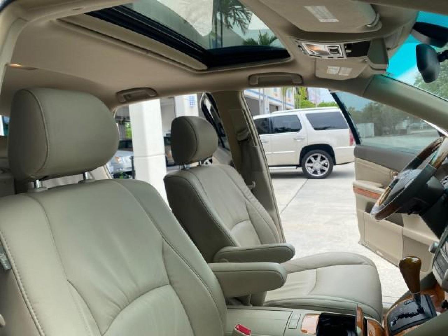 2007 Savannah Metallic /Ivory Lexus RX 350 1 OWNER FLORIDA LOW MILES 83,334 (2T2GK31U47C) with an 3.5L DOHC SMPI 24-Valve V6 Engine engine, Automatic transmission, located at 4701 North Dixie Hwy, Pompano Beach, FL, 33064, (954) 422-2889, 26.240938, -80.123474 - OUR WEBPAGE FLORIDACARS1.COM HAS OVER 100 PHOTOS AND FREE CARFAX LINK 2007 LEXUS RX 350 $ 44,790 NEW VIN: 2T2GK31U47C004222 2 T 2 G K 3 1 U 4 7 C 0 0 4 2 2 2 4 DOOR WAGON/SPORT UTILITY 3.5L V6 F DOHC 24V GASOLINE FRONT WHEEL DRIVE Top Features Alloy Wheels Leather Seats Memory Seat(s) Power Hatch/De - Photo#12