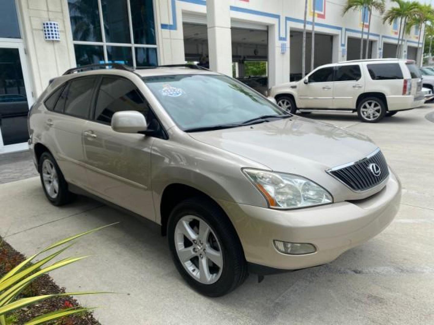 2007 Savannah Metallic /Ivory Lexus RX 350 1 OWNER FLORIDA LOW MILES 83,334 (2T2GK31U47C) with an 3.5L DOHC SMPI 24-Valve V6 Engine engine, Automatic transmission, located at 4701 North Dixie Hwy, Pompano Beach, FL, 33064, (954) 422-2889, 26.240938, -80.123474 - OUR WEBPAGE FLORIDACARS1.COM HAS OVER 100 PHOTOS AND FREE CARFAX LINK 2007 LEXUS RX 350 $ 44,790 NEW VIN: 2T2GK31U47C004222 2 T 2 G K 3 1 U 4 7 C 0 0 4 2 2 2 4 DOOR WAGON/SPORT UTILITY 3.5L V6 F DOHC 24V GASOLINE FRONT WHEEL DRIVE Top Features Alloy Wheels Leather Seats Memory Seat(s) Power Hatch/De - Photo#24