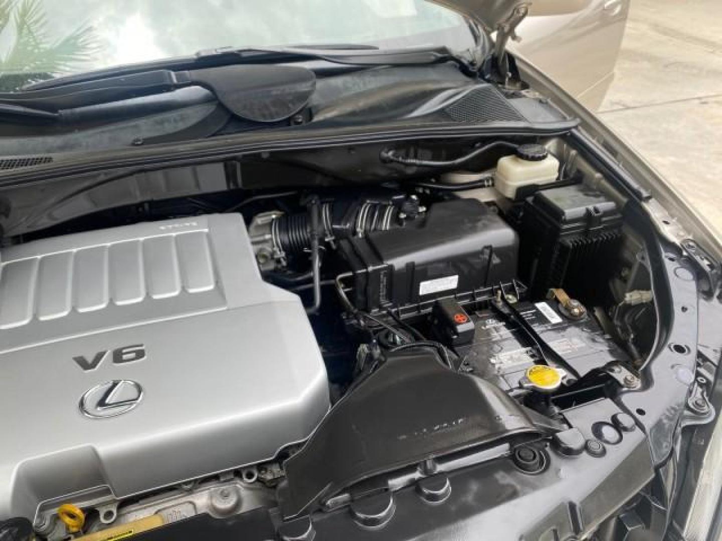 2007 Savannah Metallic /Ivory Lexus RX 350 1 OWNER FLORIDA LOW MILES 83,334 (2T2GK31U47C) with an 3.5L DOHC SMPI 24-Valve V6 Engine engine, Automatic transmission, located at 4701 North Dixie Hwy, Pompano Beach, FL, 33064, (954) 422-2889, 26.240938, -80.123474 - OUR WEBPAGE FLORIDACARS1.COM HAS OVER 100 PHOTOS AND FREE CARFAX LINK 2007 LEXUS RX 350 $ 44,790 NEW VIN: 2T2GK31U47C004222 2 T 2 G K 3 1 U 4 7 C 0 0 4 2 2 2 4 DOOR WAGON/SPORT UTILITY 3.5L V6 F DOHC 24V GASOLINE FRONT WHEEL DRIVE Top Features Alloy Wheels Leather Seats Memory Seat(s) Power Hatch/De - Photo#26