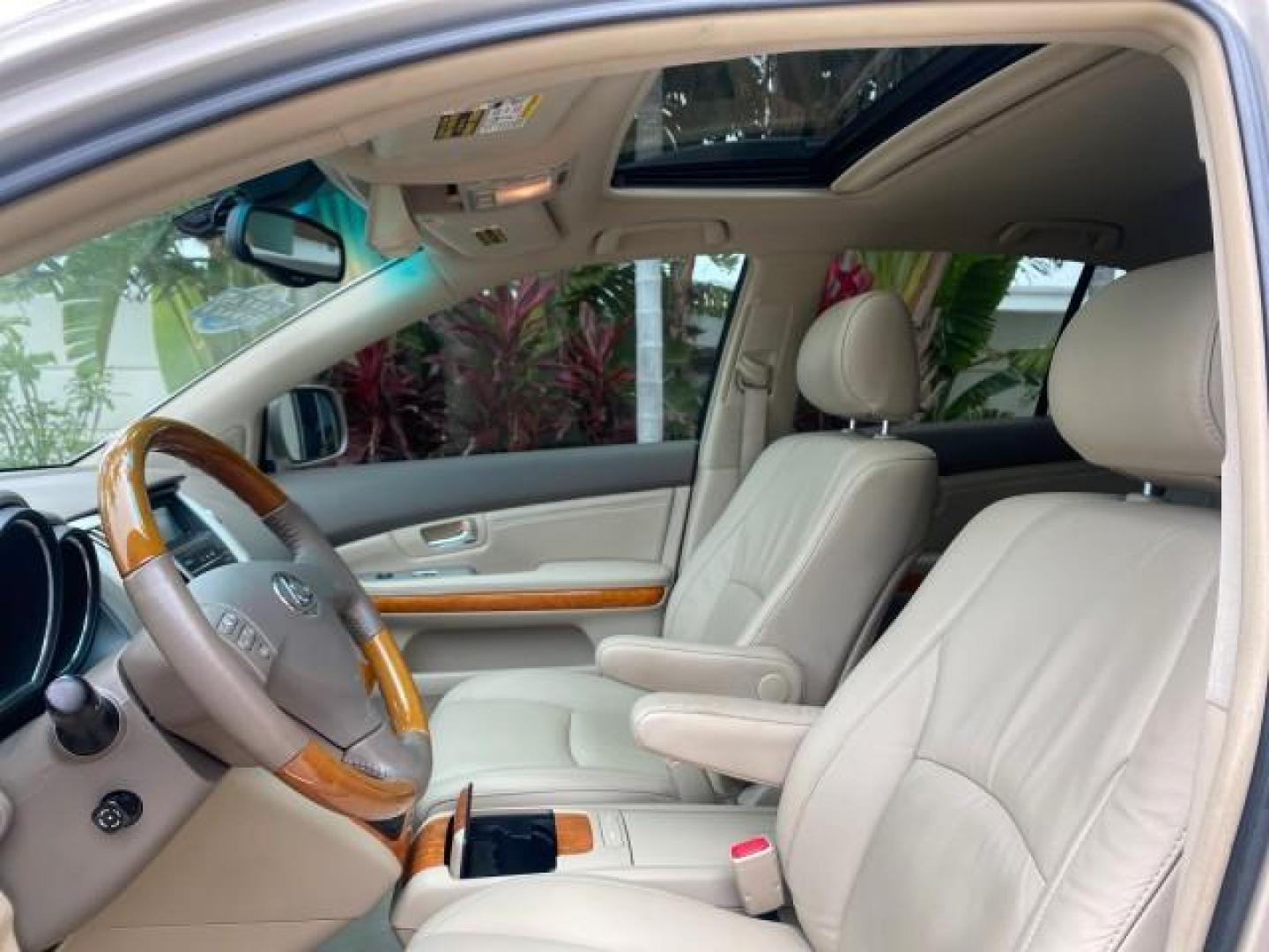 2007 Savannah Metallic /Ivory Lexus RX 350 1 OWNER FLORIDA LOW MILES 83,334 (2T2GK31U47C) with an 3.5L DOHC SMPI 24-Valve V6 Engine engine, Automatic transmission, located at 4701 North Dixie Hwy, Pompano Beach, FL, 33064, (954) 422-2889, 26.240938, -80.123474 - OUR WEBPAGE FLORIDACARS1.COM HAS OVER 100 PHOTOS AND FREE CARFAX LINK 2007 LEXUS RX 350 $ 44,790 NEW VIN: 2T2GK31U47C004222 2 T 2 G K 3 1 U 4 7 C 0 0 4 2 2 2 4 DOOR WAGON/SPORT UTILITY 3.5L V6 F DOHC 24V GASOLINE FRONT WHEEL DRIVE Top Features Alloy Wheels Leather Seats Memory Seat(s) Power Hatch/De - Photo#33