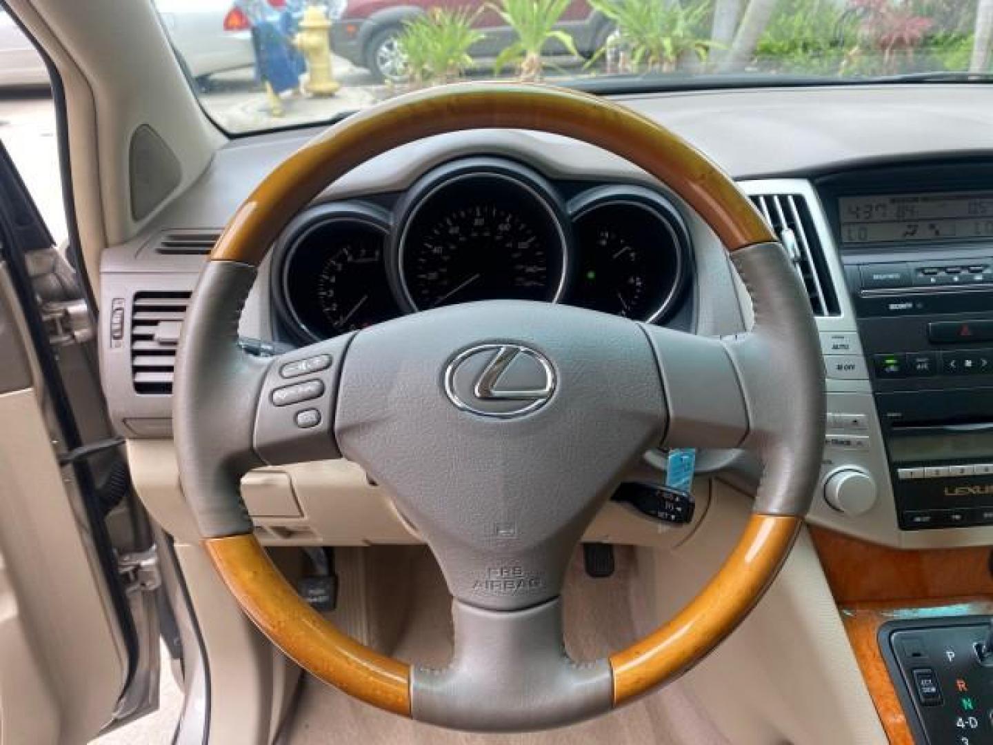 2007 Savannah Metallic /Ivory Lexus RX 350 1 OWNER FLORIDA LOW MILES 83,334 (2T2GK31U47C) with an 3.5L DOHC SMPI 24-Valve V6 Engine engine, Automatic transmission, located at 4701 North Dixie Hwy, Pompano Beach, FL, 33064, (954) 422-2889, 26.240938, -80.123474 - OUR WEBPAGE FLORIDACARS1.COM HAS OVER 100 PHOTOS AND FREE CARFAX LINK 2007 LEXUS RX 350 $ 44,790 NEW VIN: 2T2GK31U47C004222 2 T 2 G K 3 1 U 4 7 C 0 0 4 2 2 2 4 DOOR WAGON/SPORT UTILITY 3.5L V6 F DOHC 24V GASOLINE FRONT WHEEL DRIVE Top Features Alloy Wheels Leather Seats Memory Seat(s) Power Hatch/De - Photo#37