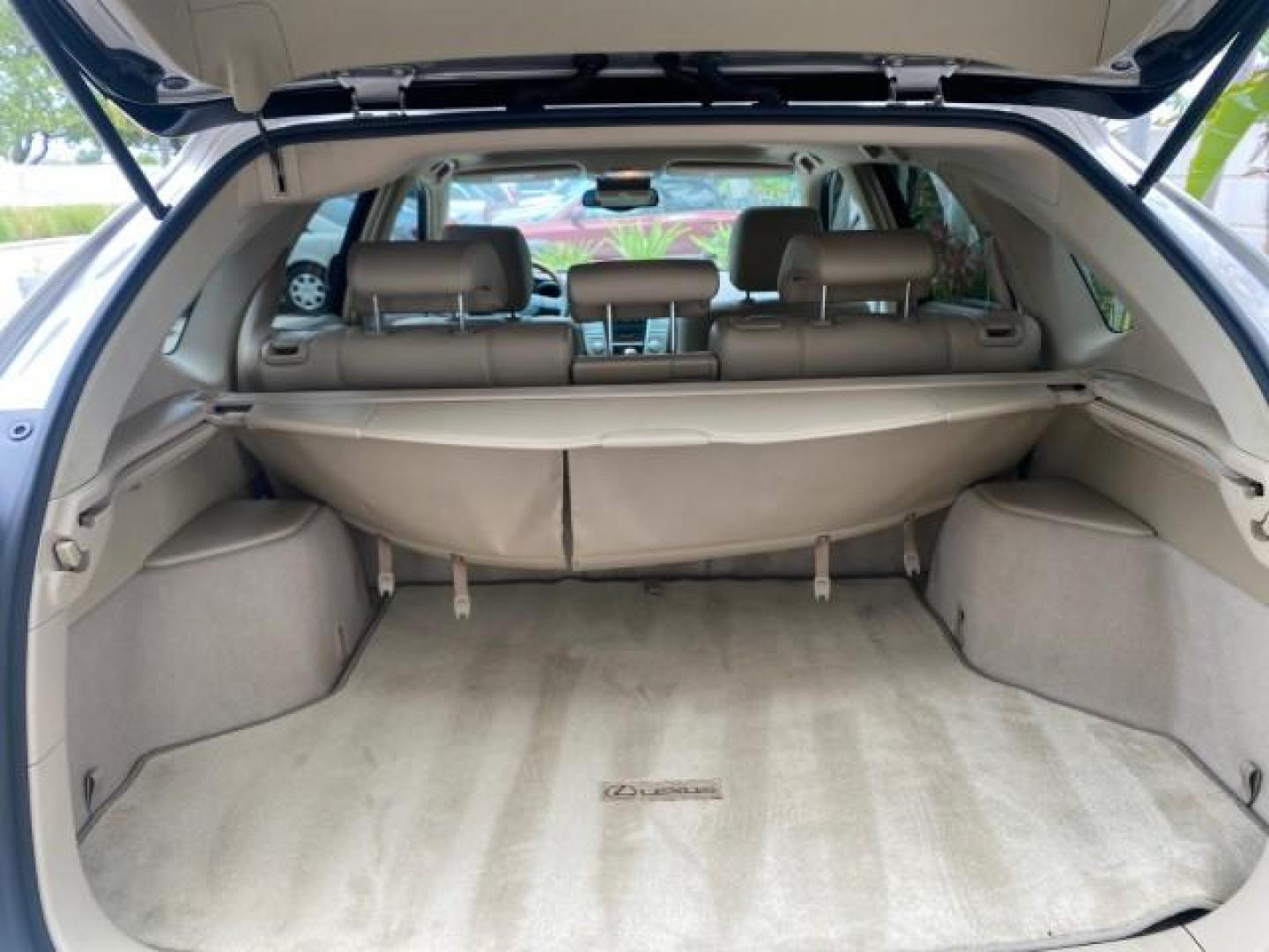 2007 Savannah Metallic /Ivory Lexus RX 350 1 OWNER FLORIDA LOW MILES 83,334 (2T2GK31U47C) with an 3.5L DOHC SMPI 24-Valve V6 Engine engine, Automatic transmission, located at 4701 North Dixie Hwy, Pompano Beach, FL, 33064, (954) 422-2889, 26.240938, -80.123474 - OUR WEBPAGE FLORIDACARS1.COM HAS OVER 100 PHOTOS AND FREE CARFAX LINK 2007 LEXUS RX 350 $ 44,790 NEW VIN: 2T2GK31U47C004222 2 T 2 G K 3 1 U 4 7 C 0 0 4 2 2 2 4 DOOR WAGON/SPORT UTILITY 3.5L V6 F DOHC 24V GASOLINE FRONT WHEEL DRIVE Top Features Alloy Wheels Leather Seats Memory Seat(s) Power Hatch/De - Photo#81