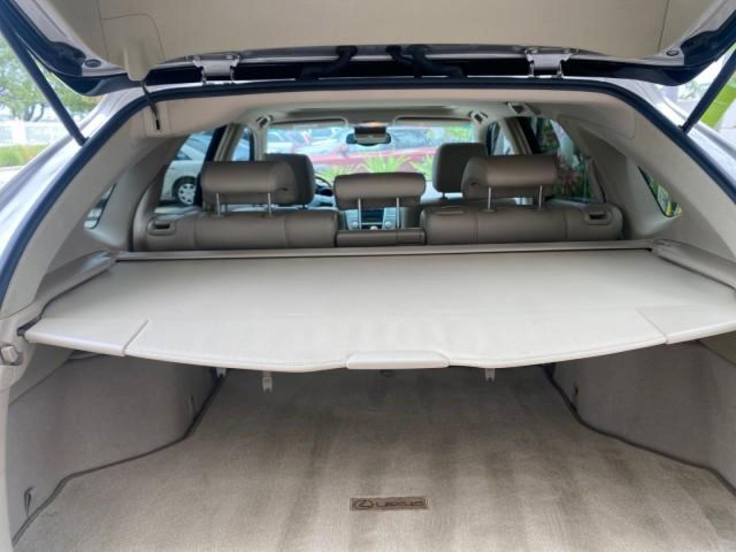 2007 Savannah Metallic /Ivory Lexus RX 350 1 OWNER FLORIDA LOW MILES 83,334 (2T2GK31U47C) with an 3.5L DOHC SMPI 24-Valve V6 Engine engine, Automatic transmission, located at 4701 North Dixie Hwy, Pompano Beach, FL, 33064, (954) 422-2889, 26.240938, -80.123474 - OUR WEBPAGE FLORIDACARS1.COM HAS OVER 100 PHOTOS AND FREE CARFAX LINK 2007 LEXUS RX 350 $ 44,790 NEW VIN: 2T2GK31U47C004222 2 T 2 G K 3 1 U 4 7 C 0 0 4 2 2 2 4 DOOR WAGON/SPORT UTILITY 3.5L V6 F DOHC 24V GASOLINE FRONT WHEEL DRIVE Top Features Alloy Wheels Leather Seats Memory Seat(s) Power Hatch/De - Photo#82