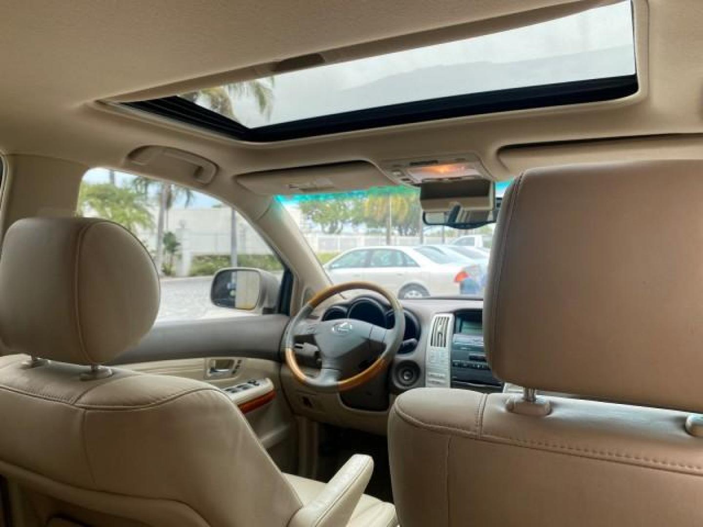 2007 Savannah Metallic /Ivory Lexus RX 350 1 OWNER FLORIDA LOW MILES 83,334 (2T2GK31U47C) with an 3.5L DOHC SMPI 24-Valve V6 Engine engine, Automatic transmission, located at 4701 North Dixie Hwy, Pompano Beach, FL, 33064, (954) 422-2889, 26.240938, -80.123474 - OUR WEBPAGE FLORIDACARS1.COM HAS OVER 100 PHOTOS AND FREE CARFAX LINK 2007 LEXUS RX 350 $ 44,790 NEW VIN: 2T2GK31U47C004222 2 T 2 G K 3 1 U 4 7 C 0 0 4 2 2 2 4 DOOR WAGON/SPORT UTILITY 3.5L V6 F DOHC 24V GASOLINE FRONT WHEEL DRIVE Top Features Alloy Wheels Leather Seats Memory Seat(s) Power Hatch/De - Photo#93