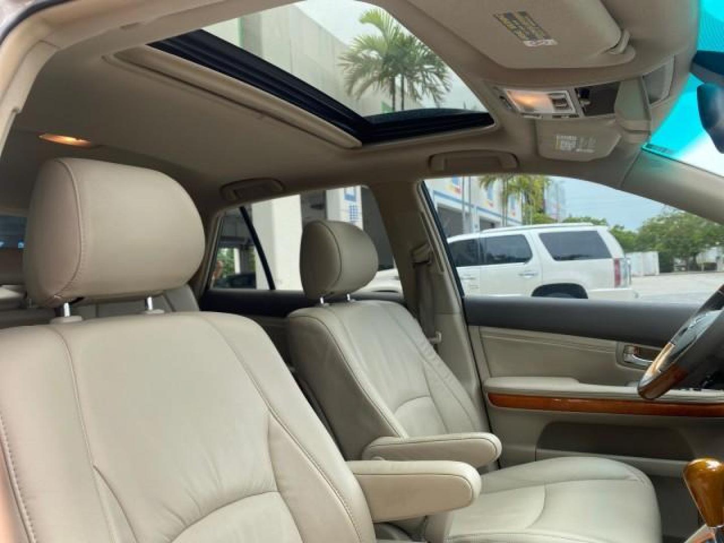 2007 Savannah Metallic /Ivory Lexus RX 350 1 OWNER FLORIDA LOW MILES 83,334 (2T2GK31U47C) with an 3.5L DOHC SMPI 24-Valve V6 Engine engine, Automatic transmission, located at 4701 North Dixie Hwy, Pompano Beach, FL, 33064, (954) 422-2889, 26.240938, -80.123474 - OUR WEBPAGE FLORIDACARS1.COM HAS OVER 100 PHOTOS AND FREE CARFAX LINK 2007 LEXUS RX 350 $ 44,790 NEW VIN: 2T2GK31U47C004222 2 T 2 G K 3 1 U 4 7 C 0 0 4 2 2 2 4 DOOR WAGON/SPORT UTILITY 3.5L V6 F DOHC 24V GASOLINE FRONT WHEEL DRIVE Top Features Alloy Wheels Leather Seats Memory Seat(s) Power Hatch/De - Photo#97