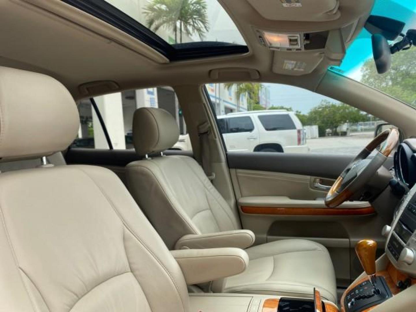 2007 Savannah Metallic /Ivory Lexus RX 350 1 OWNER FLORIDA LOW MILES 83,334 (2T2GK31U47C) with an 3.5L DOHC SMPI 24-Valve V6 Engine engine, Automatic transmission, located at 4701 North Dixie Hwy, Pompano Beach, FL, 33064, (954) 422-2889, 26.240938, -80.123474 - OUR WEBPAGE FLORIDACARS1.COM HAS OVER 100 PHOTOS AND FREE CARFAX LINK 2007 LEXUS RX 350 $ 44,790 NEW VIN: 2T2GK31U47C004222 2 T 2 G K 3 1 U 4 7 C 0 0 4 2 2 2 4 DOOR WAGON/SPORT UTILITY 3.5L V6 F DOHC 24V GASOLINE FRONT WHEEL DRIVE Top Features Alloy Wheels Leather Seats Memory Seat(s) Power Hatch/De - Photo#98