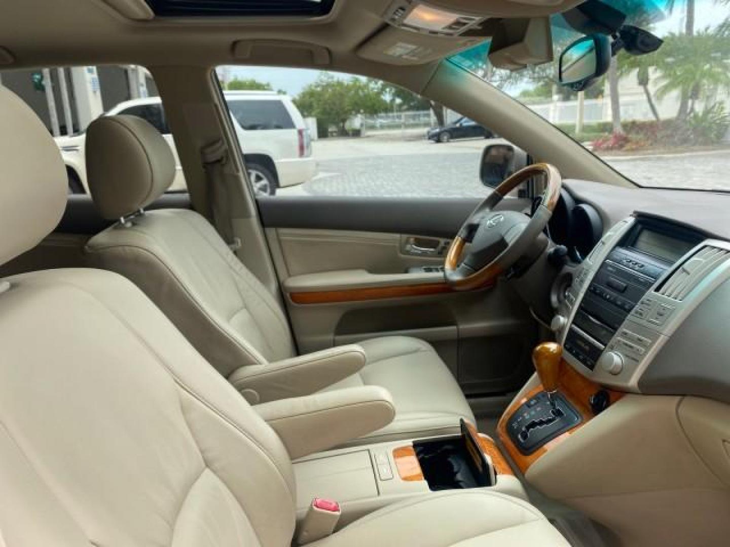 2007 Savannah Metallic /Ivory Lexus RX 350 1 OWNER FLORIDA LOW MILES 83,334 (2T2GK31U47C) with an 3.5L DOHC SMPI 24-Valve V6 Engine engine, Automatic transmission, located at 4701 North Dixie Hwy, Pompano Beach, FL, 33064, (954) 422-2889, 26.240938, -80.123474 - OUR WEBPAGE FLORIDACARS1.COM HAS OVER 100 PHOTOS AND FREE CARFAX LINK 2007 LEXUS RX 350 $ 44,790 NEW VIN: 2T2GK31U47C004222 2 T 2 G K 3 1 U 4 7 C 0 0 4 2 2 2 4 DOOR WAGON/SPORT UTILITY 3.5L V6 F DOHC 24V GASOLINE FRONT WHEEL DRIVE Top Features Alloy Wheels Leather Seats Memory Seat(s) Power Hatch/De - Photo#99