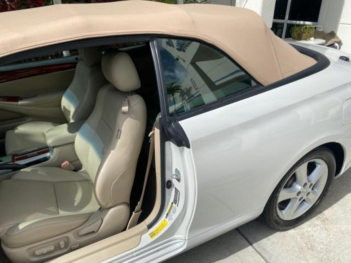 2006 Arctic Frost Pearl /Ivory Toyota Camry Solara SLE V6 1 OWNER LOW MILES 49,530 (4T1FA38P76U) with an 3.3L DOHC SMPI 24-Valve V6 Engine engine, Automatic transmission, located at 4701 North Dixie Hwy, Pompano Beach, FL, 33064, (954) 422-2889, 26.240938, -80.123474 - OUR WEBPAGE FLORIDACARS1.COM HAS OVER 100 PHOTOS AND FREE CARFAX LINK 2006 TOYOTA CAMRY SOLARA SE V6 VIN: 4T1FA38P76U095373 4 T 1 F A 3 8 P 7 6 U 0 9 5 3 7 3 CONVERTIBLE 3.3L V6 F DOHC 24V 29 MPG GASOLINE FRONT WHEEL DRIVE Top Features Alloy Wheels Leather Seats Front Seat Heaters Satellite Radio Re - Photo#59