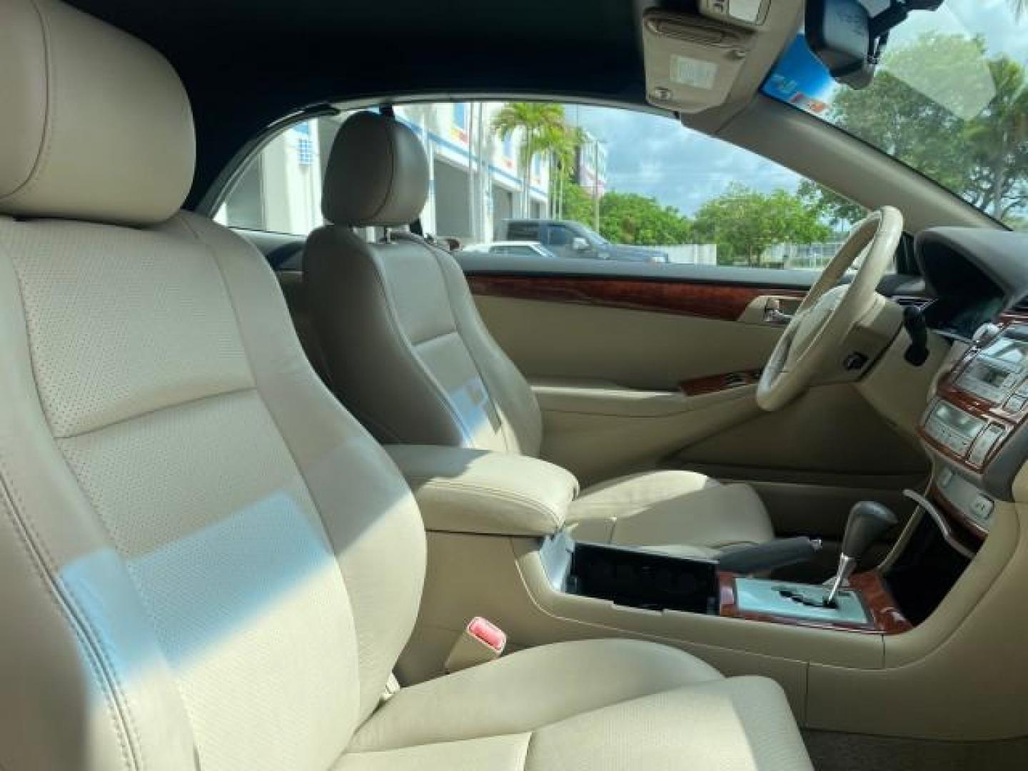2006 Arctic Frost Pearl /Ivory Toyota Camry Solara SLE V6 1 OWNER LOW MILES 49,530 (4T1FA38P76U) with an 3.3L DOHC SMPI 24-Valve V6 Engine engine, Automatic transmission, located at 4701 North Dixie Hwy, Pompano Beach, FL, 33064, (954) 422-2889, 26.240938, -80.123474 - OUR WEBPAGE FLORIDACARS1.COM HAS OVER 100 PHOTOS AND FREE CARFAX LINK 2006 TOYOTA CAMRY SOLARA SE V6 VIN: 4T1FA38P76U095373 4 T 1 F A 3 8 P 7 6 U 0 9 5 3 7 3 CONVERTIBLE 3.3L V6 F DOHC 24V 29 MPG GASOLINE FRONT WHEEL DRIVE Top Features Alloy Wheels Leather Seats Front Seat Heaters Satellite Radio Re - Photo#82