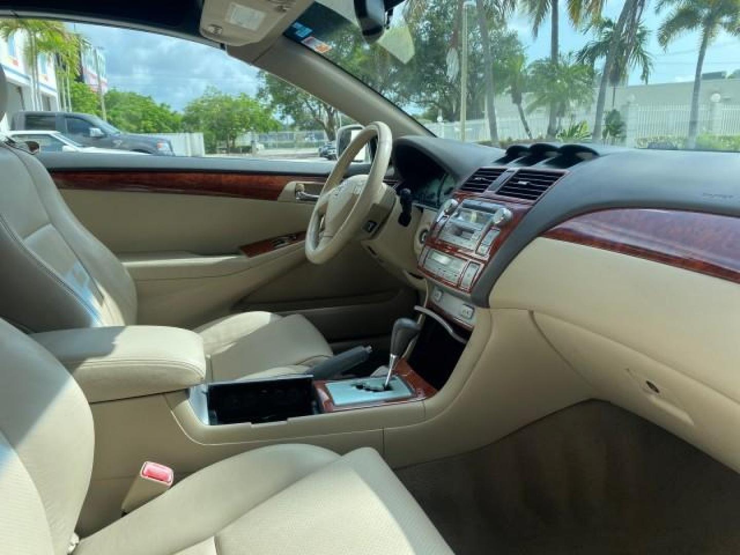 2006 Arctic Frost Pearl /Ivory Toyota Camry Solara SLE V6 1 OWNER LOW MILES 49,530 (4T1FA38P76U) with an 3.3L DOHC SMPI 24-Valve V6 Engine engine, Automatic transmission, located at 4701 North Dixie Hwy, Pompano Beach, FL, 33064, (954) 422-2889, 26.240938, -80.123474 - OUR WEBPAGE FLORIDACARS1.COM HAS OVER 100 PHOTOS AND FREE CARFAX LINK 2006 TOYOTA CAMRY SOLARA SE V6 VIN: 4T1FA38P76U095373 4 T 1 F A 3 8 P 7 6 U 0 9 5 3 7 3 CONVERTIBLE 3.3L V6 F DOHC 24V 29 MPG GASOLINE FRONT WHEEL DRIVE Top Features Alloy Wheels Leather Seats Front Seat Heaters Satellite Radio Re - Photo#84