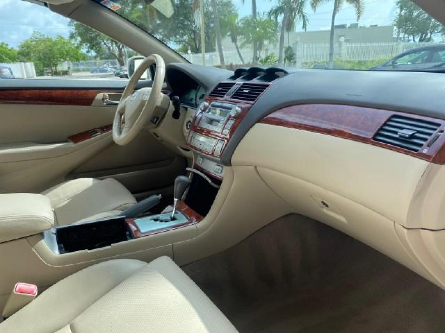 2006 Arctic Frost Pearl /Ivory Toyota Camry Solara SLE V6 1 OWNER LOW MILES 49,530 (4T1FA38P76U) with an 3.3L DOHC SMPI 24-Valve V6 Engine engine, Automatic transmission, located at 4701 North Dixie Hwy, Pompano Beach, FL, 33064, (954) 422-2889, 26.240938, -80.123474 - OUR WEBPAGE FLORIDACARS1.COM HAS OVER 100 PHOTOS AND FREE CARFAX LINK 2006 TOYOTA CAMRY SOLARA SE V6 VIN: 4T1FA38P76U095373 4 T 1 F A 3 8 P 7 6 U 0 9 5 3 7 3 CONVERTIBLE 3.3L V6 F DOHC 24V 29 MPG GASOLINE FRONT WHEEL DRIVE Top Features Alloy Wheels Leather Seats Front Seat Heaters Satellite Radio Re - Photo#85