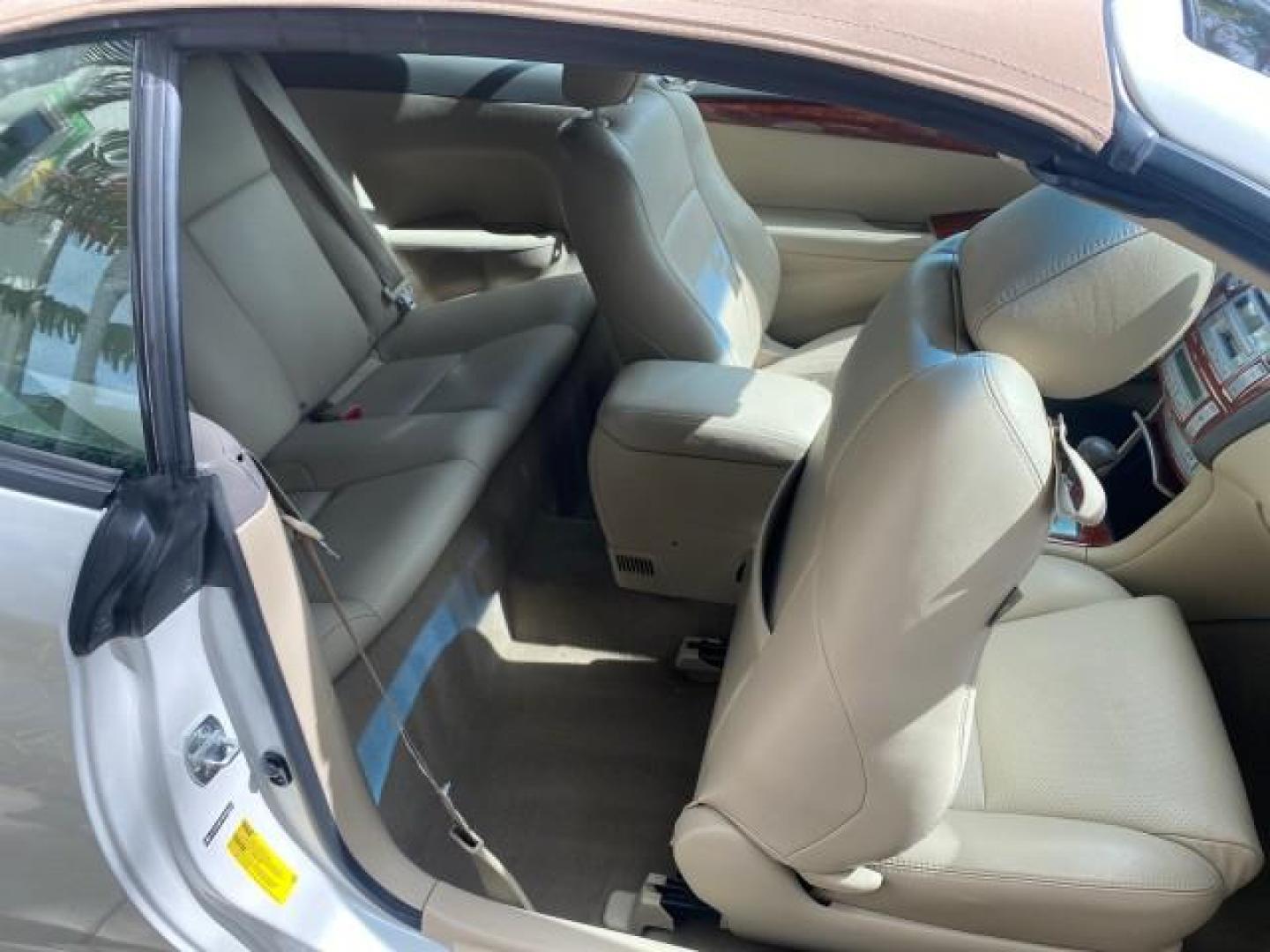 2006 Arctic Frost Pearl /Ivory Toyota Camry Solara SLE V6 1 OWNER LOW MILES 49,530 (4T1FA38P76U) with an 3.3L DOHC SMPI 24-Valve V6 Engine engine, Automatic transmission, located at 4701 North Dixie Hwy, Pompano Beach, FL, 33064, (954) 422-2889, 26.240938, -80.123474 - OUR WEBPAGE FLORIDACARS1.COM HAS OVER 100 PHOTOS AND FREE CARFAX LINK 2006 TOYOTA CAMRY SOLARA SE V6 VIN: 4T1FA38P76U095373 4 T 1 F A 3 8 P 7 6 U 0 9 5 3 7 3 CONVERTIBLE 3.3L V6 F DOHC 24V 29 MPG GASOLINE FRONT WHEEL DRIVE Top Features Alloy Wheels Leather Seats Front Seat Heaters Satellite Radio Re - Photo#86