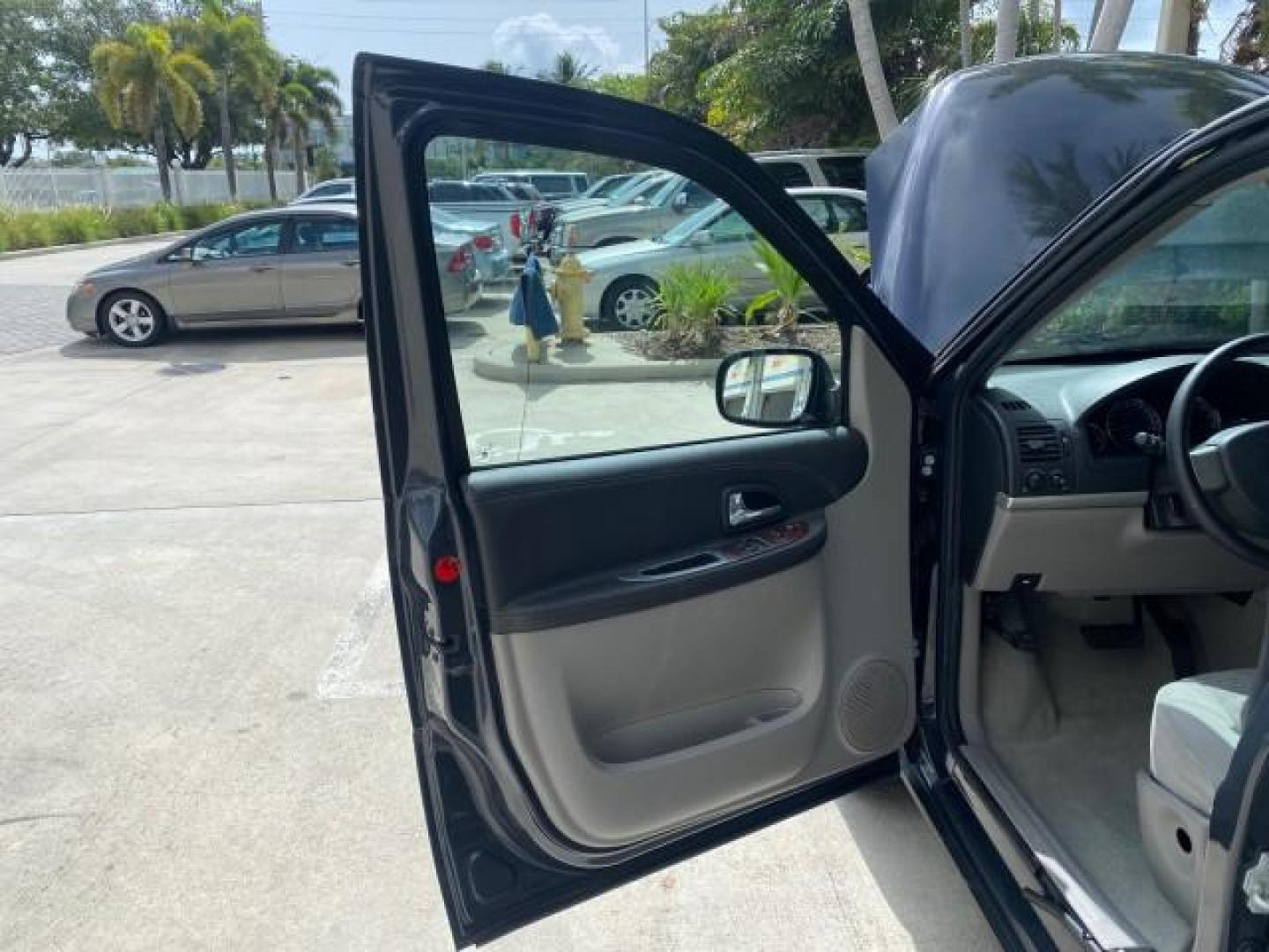 2008 Silverstone Metallic /Medium Gray Chevrolet Uplander 7 PAS LS LOW MILES 61,149 (1GNDU23W88D) with an 3.9L V6 SFI Flex-Fuel Engine engine, Automatic transmission, located at 4701 North Dixie Hwy, Pompano Beach, FL, 33064, (954) 422-2889, 26.240938, -80.123474 - OUR WEBPAGE FLORIDACARS1.COM HAS OVER 100 PHOTOS AND FREE CARFAX LINK 2008 CHEVROLET UPLANDER LS VIN: 1GNDU23W88D209144 1 G N D U 2 3 W 8 8 D 2 0 9 1 4 4 VAN 3.9L V6 F FLEX FUEL FRONT WHEEL DRIVE Top Features Cloth Seats Satellite Radio Ready Quad Seats Third Row Seat Rear Air Conditioning Basic Fea - Photo#9