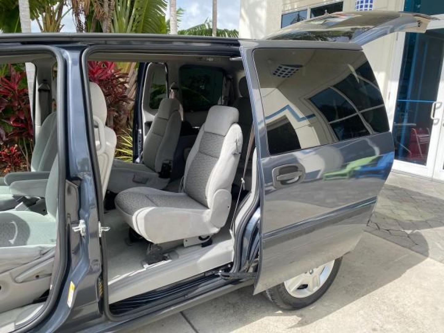 2008 Silverstone Metallic /Medium Gray Chevrolet Uplander 7 PAS LS LOW MILES 61,149 (1GNDU23W88D) with an 3.9L V6 SFI Flex-Fuel Engine engine, Automatic transmission, located at 4701 North Dixie Hwy, Pompano Beach, FL, 33064, (954) 422-2889, 26.240938, -80.123474 - OUR WEBPAGE FLORIDACARS1.COM HAS OVER 100 PHOTOS AND FREE CARFAX LINK 2008 CHEVROLET UPLANDER LS VIN: 1GNDU23W88D209144 1 G N D U 2 3 W 8 8 D 2 0 9 1 4 4 VAN 3.9L V6 F FLEX FUEL FRONT WHEEL DRIVE Top Features Cloth Seats Satellite Radio Ready Quad Seats Third Row Seat Rear Air Conditioning Basic Fea - Photo#13