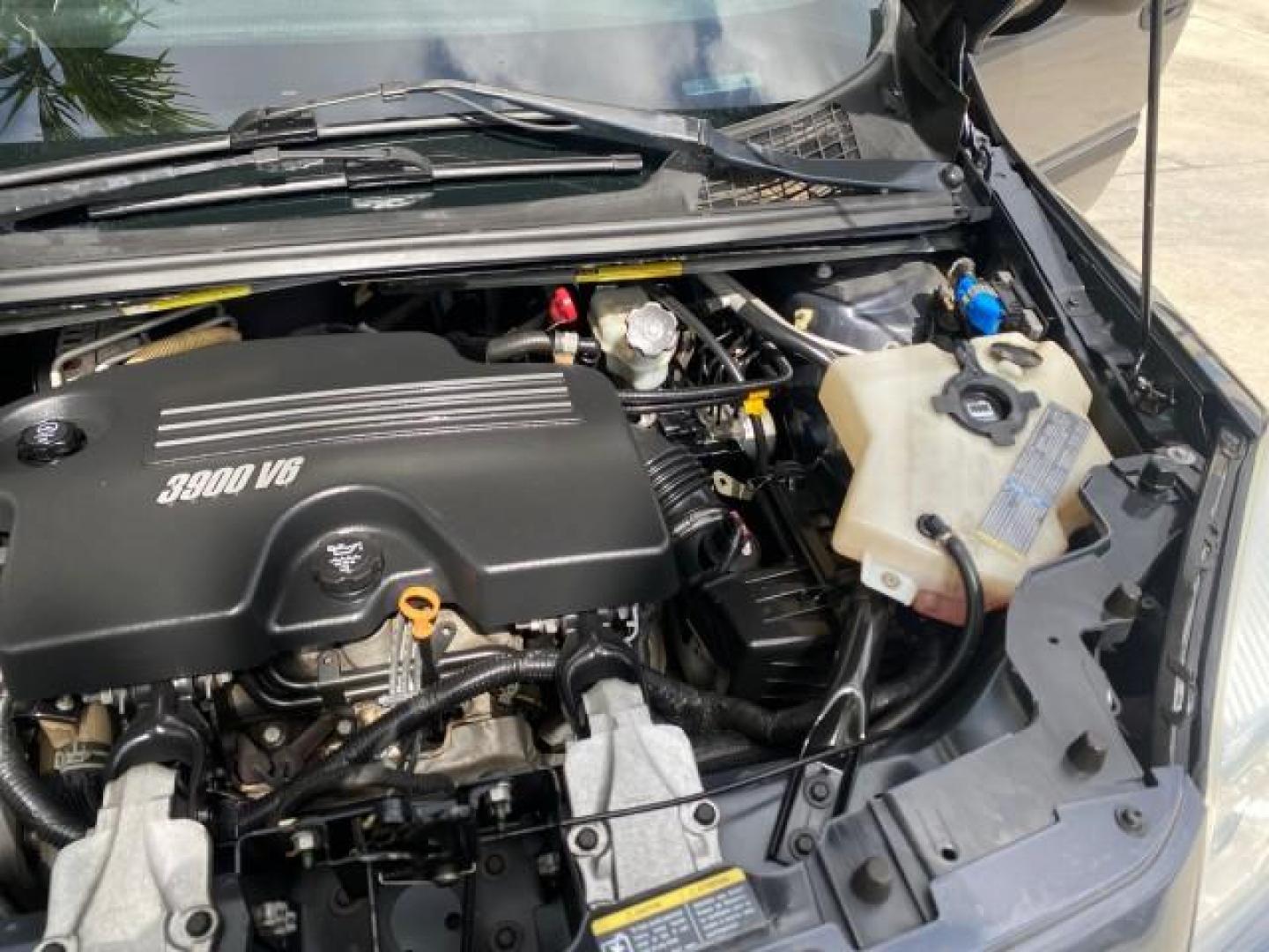 2008 Silverstone Metallic /Medium Gray Chevrolet Uplander 7 PAS LS LOW MILES 61,149 (1GNDU23W88D) with an 3.9L V6 SFI Flex-Fuel Engine engine, Automatic transmission, located at 4701 North Dixie Hwy, Pompano Beach, FL, 33064, (954) 422-2889, 26.240938, -80.123474 - OUR WEBPAGE FLORIDACARS1.COM HAS OVER 100 PHOTOS AND FREE CARFAX LINK 2008 CHEVROLET UPLANDER LS VIN: 1GNDU23W88D209144 1 G N D U 2 3 W 8 8 D 2 0 9 1 4 4 VAN 3.9L V6 F FLEX FUEL FRONT WHEEL DRIVE Top Features Cloth Seats Satellite Radio Ready Quad Seats Third Row Seat Rear Air Conditioning Basic Fea - Photo#25