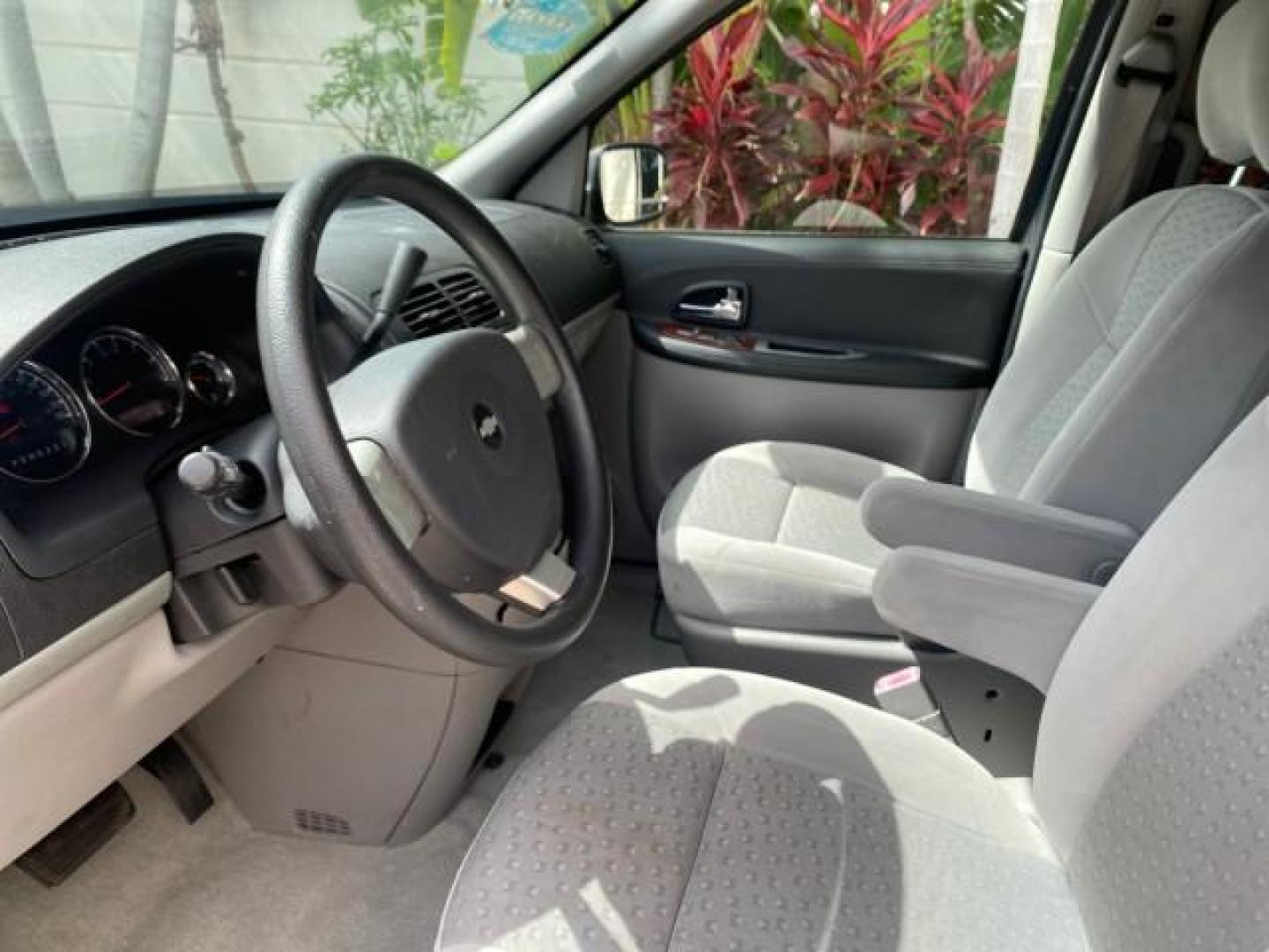 2008 Silverstone Metallic /Medium Gray Chevrolet Uplander 7 PAS LS LOW MILES 61,149 (1GNDU23W88D) with an 3.9L V6 SFI Flex-Fuel Engine engine, Automatic transmission, located at 4701 North Dixie Hwy, Pompano Beach, FL, 33064, (954) 422-2889, 26.240938, -80.123474 - OUR WEBPAGE FLORIDACARS1.COM HAS OVER 100 PHOTOS AND FREE CARFAX LINK 2008 CHEVROLET UPLANDER LS VIN: 1GNDU23W88D209144 1 G N D U 2 3 W 8 8 D 2 0 9 1 4 4 VAN 3.9L V6 F FLEX FUEL FRONT WHEEL DRIVE Top Features Cloth Seats Satellite Radio Ready Quad Seats Third Row Seat Rear Air Conditioning Basic Fea - Photo#33