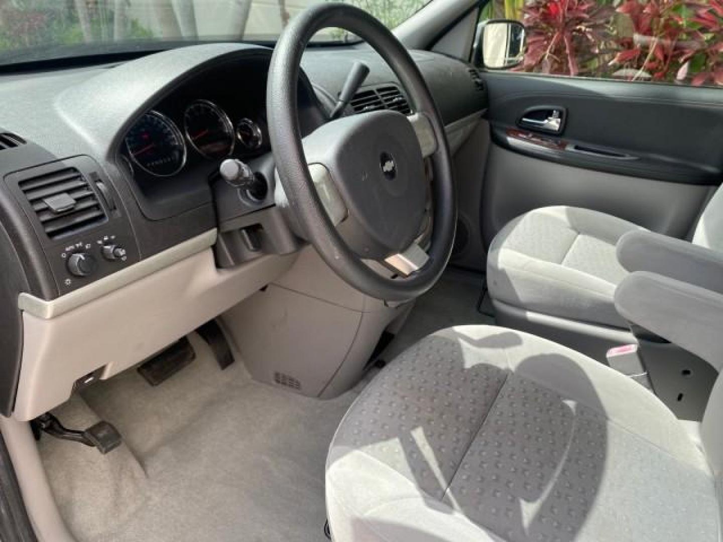 2008 Silverstone Metallic /Medium Gray Chevrolet Uplander 7 PAS LS LOW MILES 61,149 (1GNDU23W88D) with an 3.9L V6 SFI Flex-Fuel Engine engine, Automatic transmission, located at 4701 North Dixie Hwy, Pompano Beach, FL, 33064, (954) 422-2889, 26.240938, -80.123474 - OUR WEBPAGE FLORIDACARS1.COM HAS OVER 100 PHOTOS AND FREE CARFAX LINK 2008 CHEVROLET UPLANDER LS VIN: 1GNDU23W88D209144 1 G N D U 2 3 W 8 8 D 2 0 9 1 4 4 VAN 3.9L V6 F FLEX FUEL FRONT WHEEL DRIVE Top Features Cloth Seats Satellite Radio Ready Quad Seats Third Row Seat Rear Air Conditioning Basic Fea - Photo#34