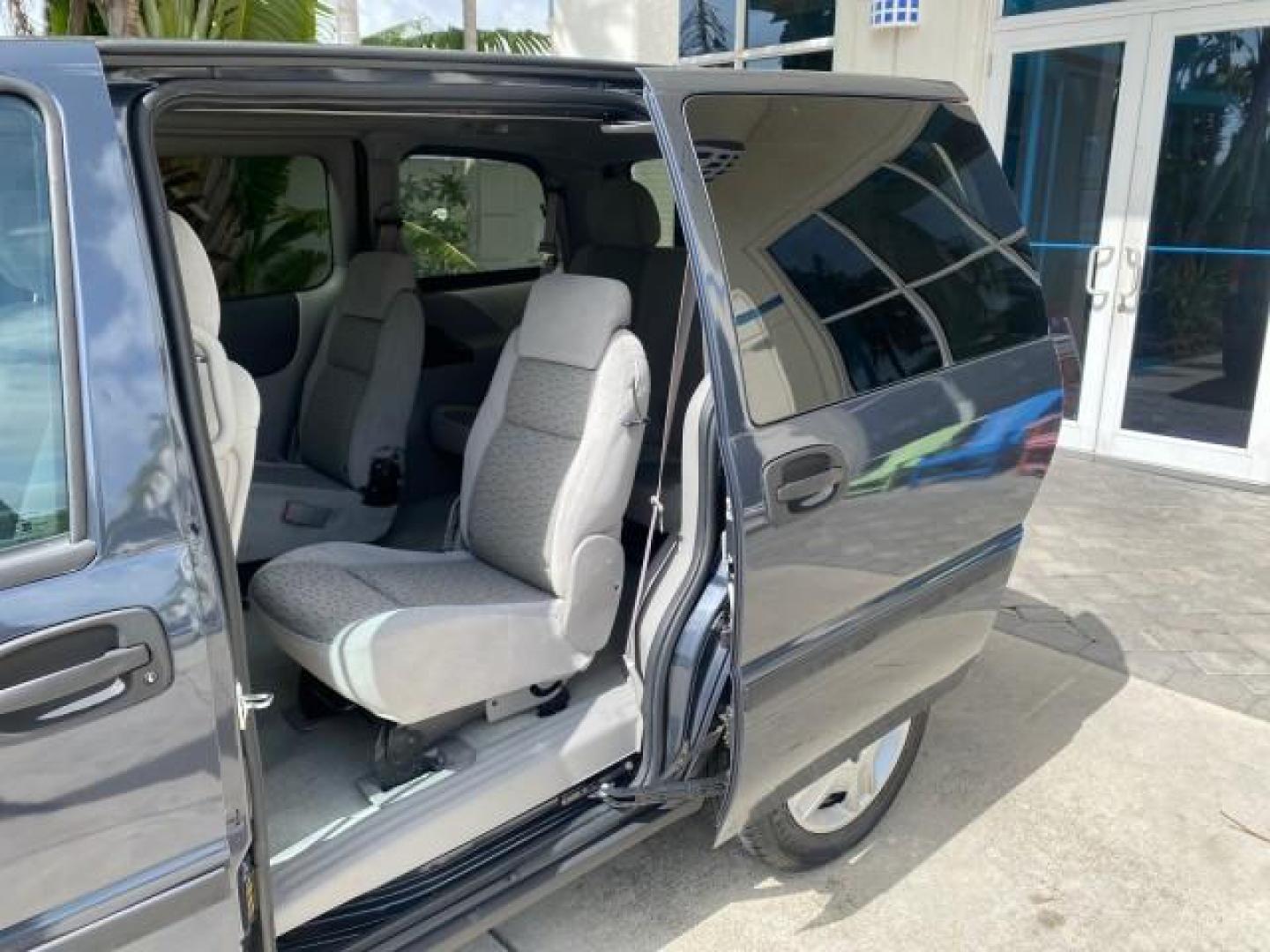 2008 Silverstone Metallic /Medium Gray Chevrolet Uplander 7 PAS LS LOW MILES 61,149 (1GNDU23W88D) with an 3.9L V6 SFI Flex-Fuel Engine engine, Automatic transmission, located at 4701 North Dixie Hwy, Pompano Beach, FL, 33064, (954) 422-2889, 26.240938, -80.123474 - OUR WEBPAGE FLORIDACARS1.COM HAS OVER 100 PHOTOS AND FREE CARFAX LINK 2008 CHEVROLET UPLANDER LS VIN: 1GNDU23W88D209144 1 G N D U 2 3 W 8 8 D 2 0 9 1 4 4 VAN 3.9L V6 F FLEX FUEL FRONT WHEEL DRIVE Top Features Cloth Seats Satellite Radio Ready Quad Seats Third Row Seat Rear Air Conditioning Basic Fea - Photo#55