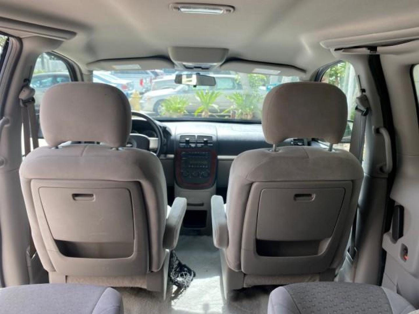 2008 Silverstone Metallic /Medium Gray Chevrolet Uplander 7 PAS LS LOW MILES 61,149 (1GNDU23W88D) with an 3.9L V6 SFI Flex-Fuel Engine engine, Automatic transmission, located at 4701 North Dixie Hwy, Pompano Beach, FL, 33064, (954) 422-2889, 26.240938, -80.123474 - OUR WEBPAGE FLORIDACARS1.COM HAS OVER 100 PHOTOS AND FREE CARFAX LINK 2008 CHEVROLET UPLANDER LS VIN: 1GNDU23W88D209144 1 G N D U 2 3 W 8 8 D 2 0 9 1 4 4 VAN 3.9L V6 F FLEX FUEL FRONT WHEEL DRIVE Top Features Cloth Seats Satellite Radio Ready Quad Seats Third Row Seat Rear Air Conditioning Basic Fea - Photo#65