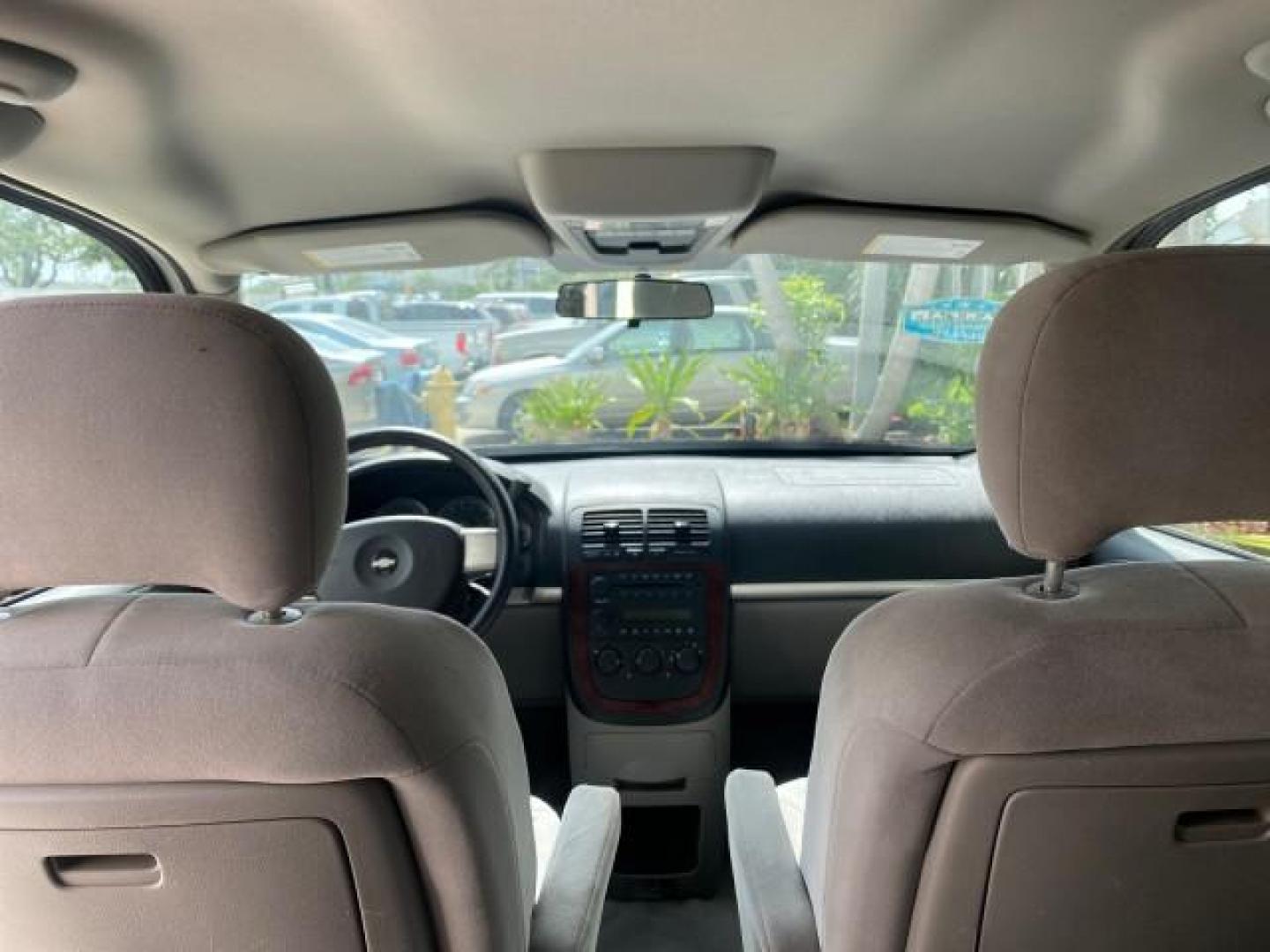 2008 Silverstone Metallic /Medium Gray Chevrolet Uplander 7 PAS LS LOW MILES 61,149 (1GNDU23W88D) with an 3.9L V6 SFI Flex-Fuel Engine engine, Automatic transmission, located at 4701 North Dixie Hwy, Pompano Beach, FL, 33064, (954) 422-2889, 26.240938, -80.123474 - OUR WEBPAGE FLORIDACARS1.COM HAS OVER 100 PHOTOS AND FREE CARFAX LINK 2008 CHEVROLET UPLANDER LS VIN: 1GNDU23W88D209144 1 G N D U 2 3 W 8 8 D 2 0 9 1 4 4 VAN 3.9L V6 F FLEX FUEL FRONT WHEEL DRIVE Top Features Cloth Seats Satellite Radio Ready Quad Seats Third Row Seat Rear Air Conditioning Basic Fea - Photo#68