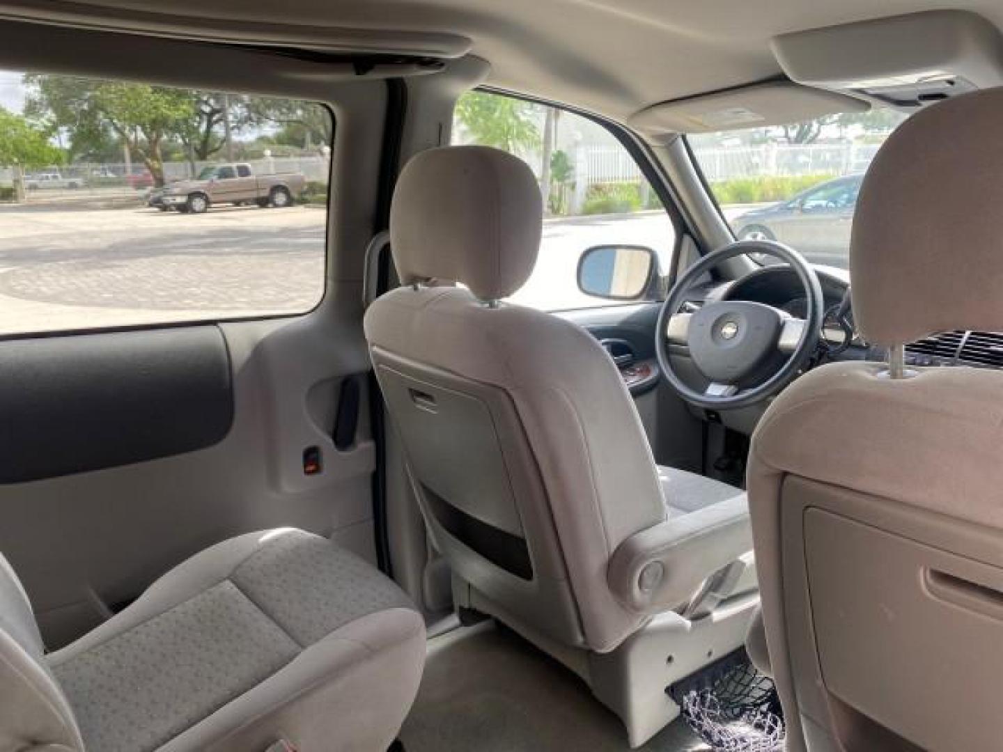 2008 Silverstone Metallic /Medium Gray Chevrolet Uplander 7 PAS LS LOW MILES 61,149 (1GNDU23W88D) with an 3.9L V6 SFI Flex-Fuel Engine engine, Automatic transmission, located at 4701 North Dixie Hwy, Pompano Beach, FL, 33064, (954) 422-2889, 26.240938, -80.123474 - OUR WEBPAGE FLORIDACARS1.COM HAS OVER 100 PHOTOS AND FREE CARFAX LINK 2008 CHEVROLET UPLANDER LS VIN: 1GNDU23W88D209144 1 G N D U 2 3 W 8 8 D 2 0 9 1 4 4 VAN 3.9L V6 F FLEX FUEL FRONT WHEEL DRIVE Top Features Cloth Seats Satellite Radio Ready Quad Seats Third Row Seat Rear Air Conditioning Basic Fea - Photo#90