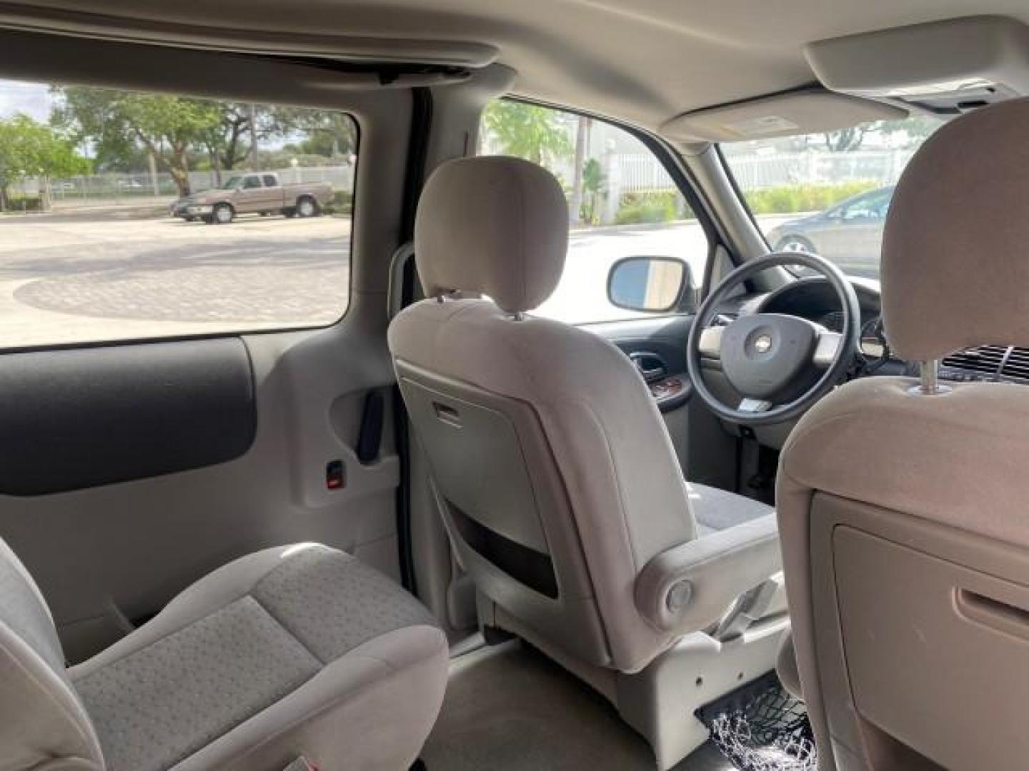 2008 Silverstone Metallic /Medium Gray Chevrolet Uplander 7 PAS LS LOW MILES 61,149 (1GNDU23W88D) with an 3.9L V6 SFI Flex-Fuel Engine engine, Automatic transmission, located at 4701 North Dixie Hwy, Pompano Beach, FL, 33064, (954) 422-2889, 26.240938, -80.123474 - OUR WEBPAGE FLORIDACARS1.COM HAS OVER 100 PHOTOS AND FREE CARFAX LINK 2008 CHEVROLET UPLANDER LS VIN: 1GNDU23W88D209144 1 G N D U 2 3 W 8 8 D 2 0 9 1 4 4 VAN 3.9L V6 F FLEX FUEL FRONT WHEEL DRIVE Top Features Cloth Seats Satellite Radio Ready Quad Seats Third Row Seat Rear Air Conditioning Basic Fea - Photo#91