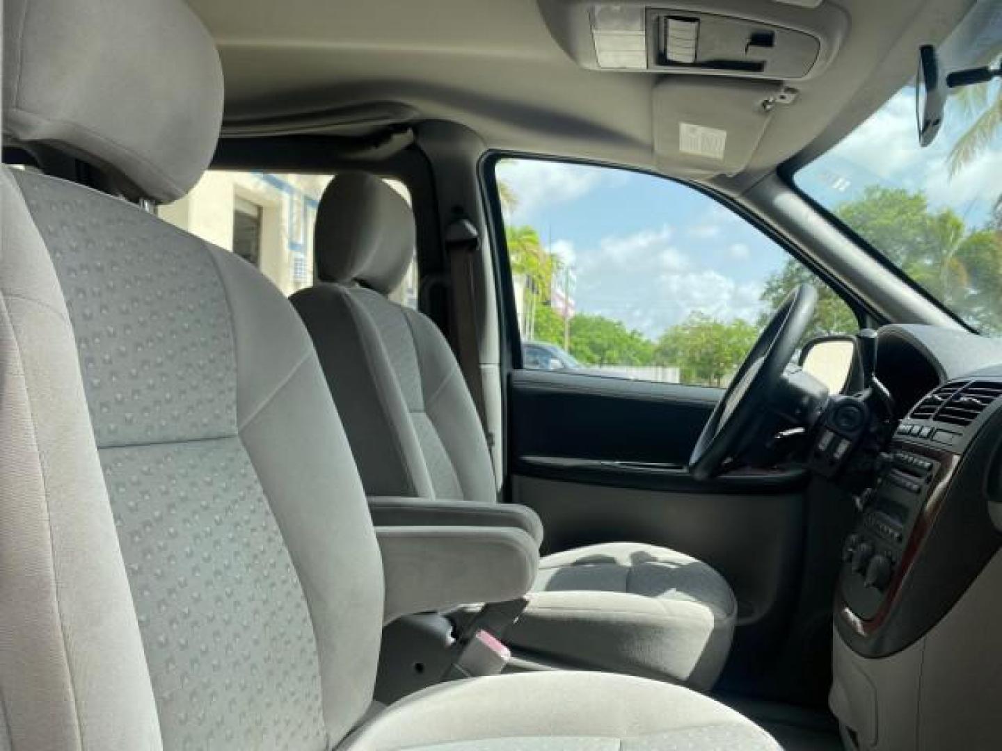 2008 Silverstone Metallic /Medium Gray Chevrolet Uplander 7 PAS LS LOW MILES 61,149 (1GNDU23W88D) with an 3.9L V6 SFI Flex-Fuel Engine engine, Automatic transmission, located at 4701 North Dixie Hwy, Pompano Beach, FL, 33064, (954) 422-2889, 26.240938, -80.123474 - OUR WEBPAGE FLORIDACARS1.COM HAS OVER 100 PHOTOS AND FREE CARFAX LINK 2008 CHEVROLET UPLANDER LS VIN: 1GNDU23W88D209144 1 G N D U 2 3 W 8 8 D 2 0 9 1 4 4 VAN 3.9L V6 F FLEX FUEL FRONT WHEEL DRIVE Top Features Cloth Seats Satellite Radio Ready Quad Seats Third Row Seat Rear Air Conditioning Basic Fea - Photo#96