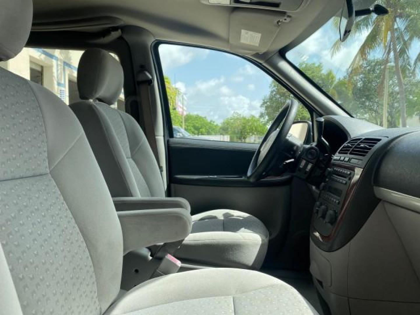 2008 Silverstone Metallic /Medium Gray Chevrolet Uplander 7 PAS LS LOW MILES 61,149 (1GNDU23W88D) with an 3.9L V6 SFI Flex-Fuel Engine engine, Automatic transmission, located at 4701 North Dixie Hwy, Pompano Beach, FL, 33064, (954) 422-2889, 26.240938, -80.123474 - OUR WEBPAGE FLORIDACARS1.COM HAS OVER 100 PHOTOS AND FREE CARFAX LINK 2008 CHEVROLET UPLANDER LS VIN: 1GNDU23W88D209144 1 G N D U 2 3 W 8 8 D 2 0 9 1 4 4 VAN 3.9L V6 F FLEX FUEL FRONT WHEEL DRIVE Top Features Cloth Seats Satellite Radio Ready Quad Seats Third Row Seat Rear Air Conditioning Basic Fea - Photo#97