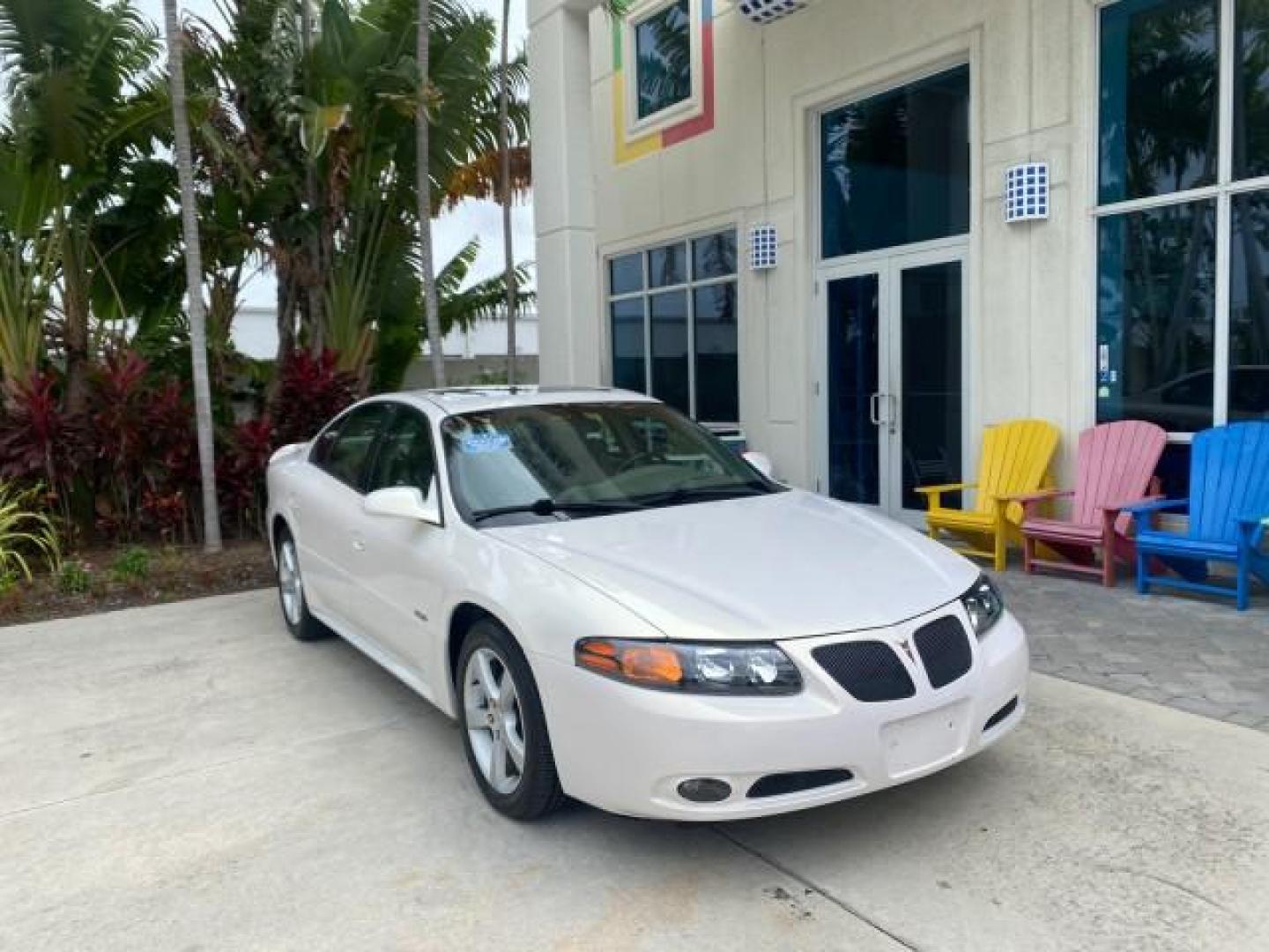 2004 White-Gold Tri Coat /Taupe Pontiac Bonneville GXP LOW MILES 43,734 V8 (1G2HZ54Y34U) with an 4.6L Northstar V8 MFI DOHC Engine engine, Automatic transmission, located at 4701 North Dixie Hwy, Pompano Beach, FL, 33064, (954) 422-2889, 26.240938, -80.123474 - OUR WEBPAGE FLORIDACARS1.COM HAS OVER 100 PHOTOS AND FREE CARFAX LINK 2004 PONTIAC BONNEVILLE GXP $ 38,335 NEW VIN: 1G2HZ54Y34U255377 1 G 2 H Z 5 4 Y 3 4 U 2 5 5 3 7 7 SEDAN 4 DR 4.6L V8 F DOHC GASOLINE FRONT WHEEL DRIVE Top Features Alloy Wheels Front Seat Heaters Head Up Display Leather and Sued - Photo#1
