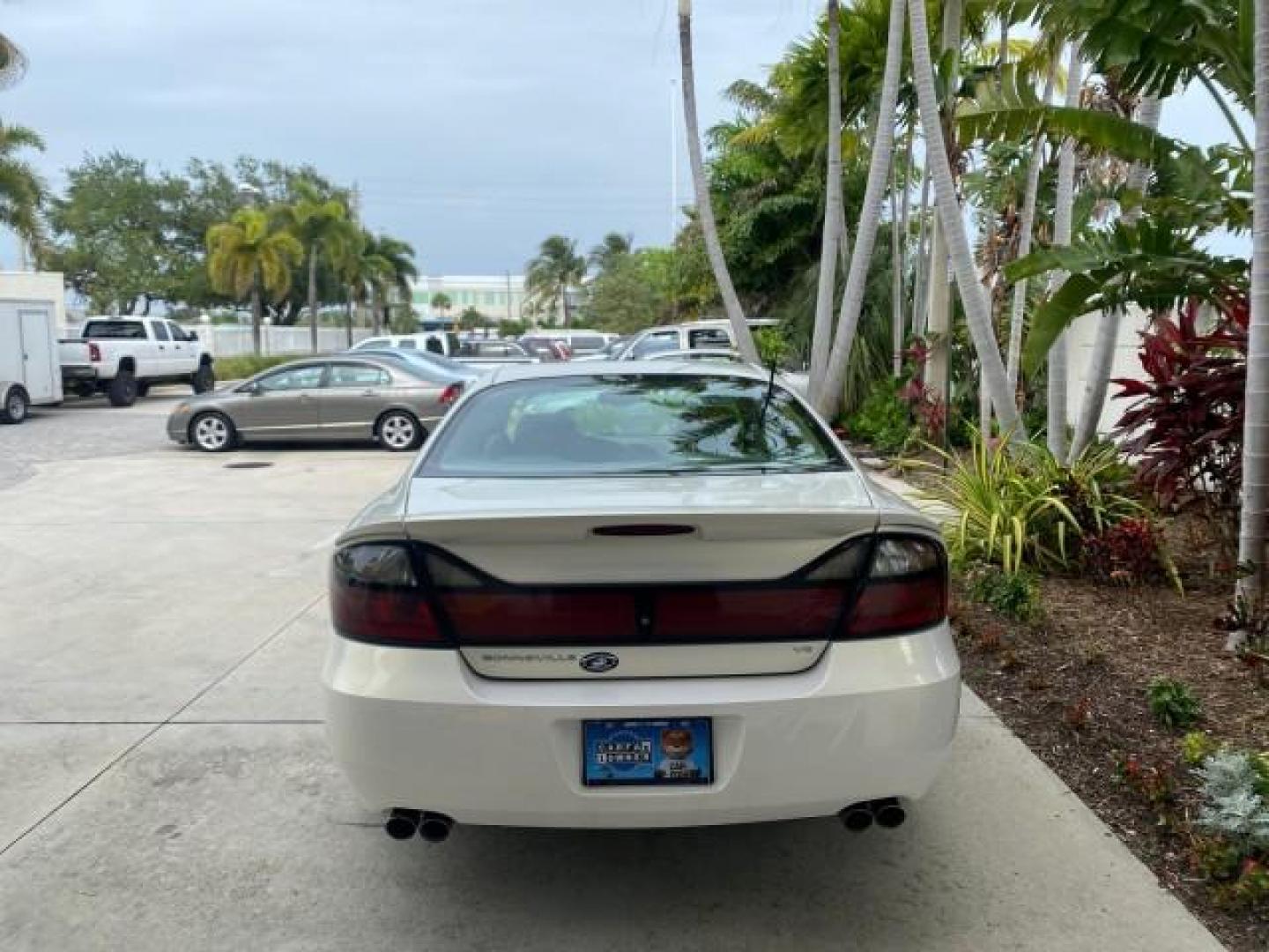 2004 White-Gold Tri Coat /Taupe Pontiac Bonneville GXP LOW MILES 43,734 V8 (1G2HZ54Y34U) with an 4.6L Northstar V8 MFI DOHC Engine engine, Automatic transmission, located at 4701 North Dixie Hwy, Pompano Beach, FL, 33064, (954) 422-2889, 26.240938, -80.123474 - OUR WEBPAGE FLORIDACARS1.COM HAS OVER 100 PHOTOS AND FREE CARFAX LINK 2004 PONTIAC BONNEVILLE GXP $ 38,335 NEW VIN: 1G2HZ54Y34U255377 1 G 2 H Z 5 4 Y 3 4 U 2 5 5 3 7 7 SEDAN 4 DR 4.6L V8 F DOHC GASOLINE FRONT WHEEL DRIVE Top Features Alloy Wheels Front Seat Heaters Head Up Display Leather and Sued - Photo#6