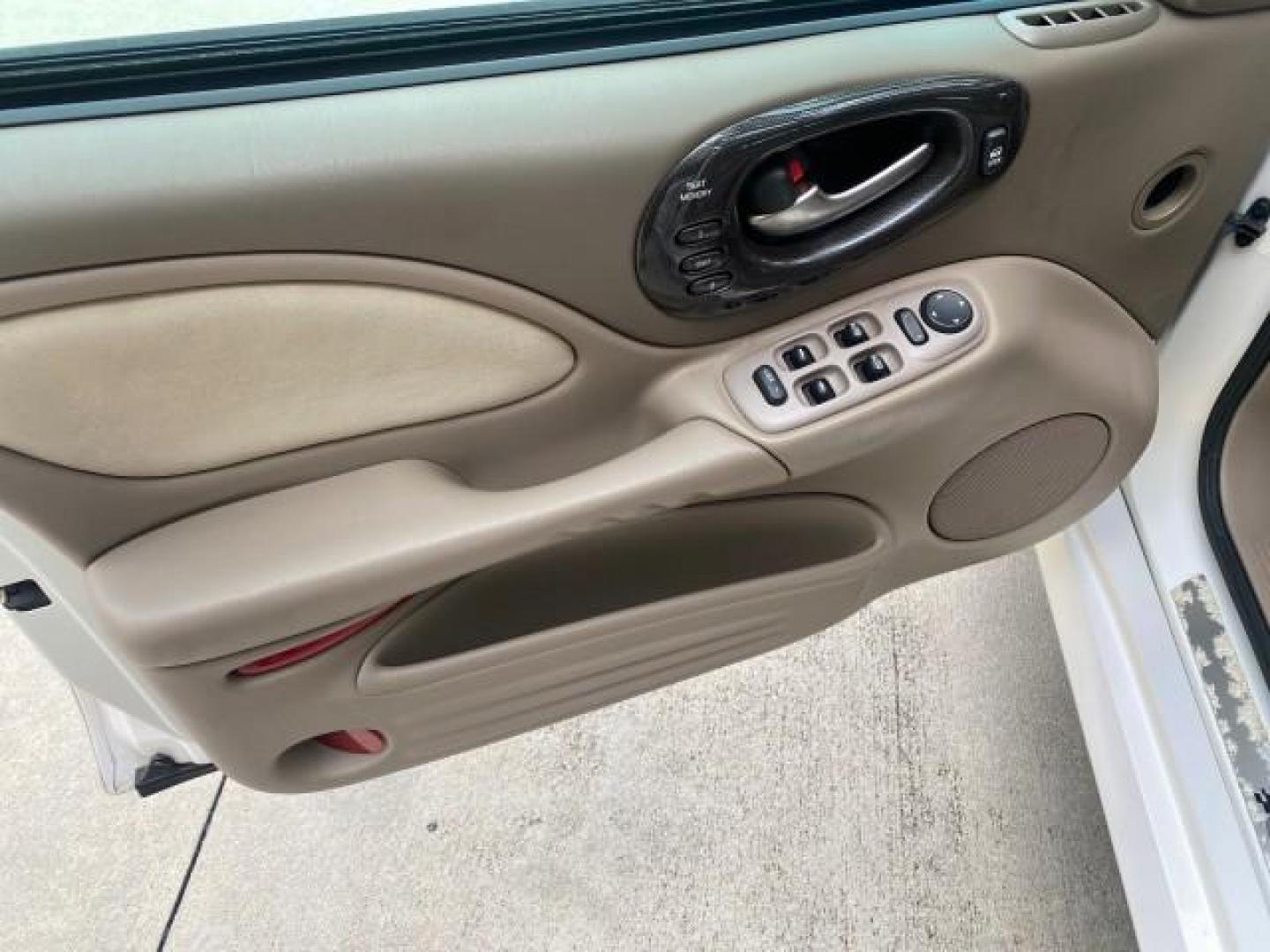 2004 White-Gold Tri Coat /Taupe Pontiac Bonneville GXP LOW MILES 43,734 V8 (1G2HZ54Y34U) with an 4.6L Northstar V8 MFI DOHC Engine engine, Automatic transmission, located at 4701 North Dixie Hwy, Pompano Beach, FL, 33064, (954) 422-2889, 26.240938, -80.123474 - OUR WEBPAGE FLORIDACARS1.COM HAS OVER 100 PHOTOS AND FREE CARFAX LINK 2004 PONTIAC BONNEVILLE GXP $ 38,335 NEW VIN: 1G2HZ54Y34U255377 1 G 2 H Z 5 4 Y 3 4 U 2 5 5 3 7 7 SEDAN 4 DR 4.6L V8 F DOHC GASOLINE FRONT WHEEL DRIVE Top Features Alloy Wheels Front Seat Heaters Head Up Display Leather and Sued - Photo#31