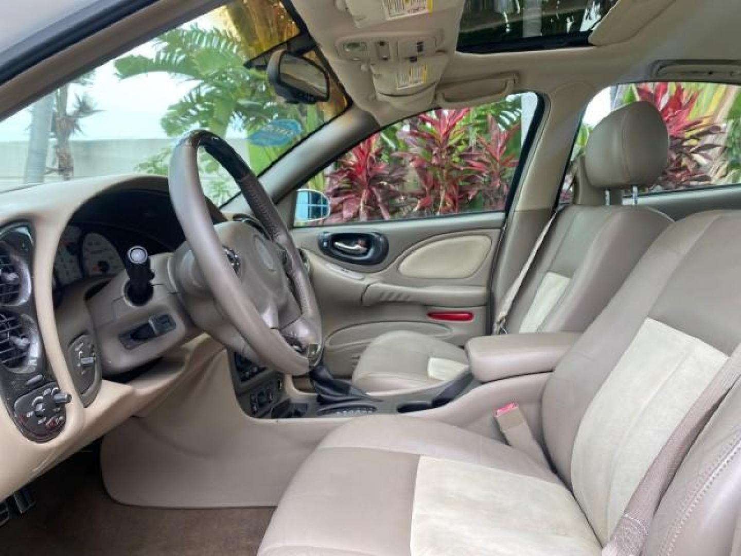 2004 White-Gold Tri Coat /Taupe Pontiac Bonneville GXP LOW MILES 43,734 V8 (1G2HZ54Y34U) with an 4.6L Northstar V8 MFI DOHC Engine engine, Automatic transmission, located at 4701 North Dixie Hwy, Pompano Beach, FL, 33064, (954) 422-2889, 26.240938, -80.123474 - OUR WEBPAGE FLORIDACARS1.COM HAS OVER 100 PHOTOS AND FREE CARFAX LINK 2004 PONTIAC BONNEVILLE GXP $ 38,335 NEW VIN: 1G2HZ54Y34U255377 1 G 2 H Z 5 4 Y 3 4 U 2 5 5 3 7 7 SEDAN 4 DR 4.6L V8 F DOHC GASOLINE FRONT WHEEL DRIVE Top Features Alloy Wheels Front Seat Heaters Head Up Display Leather and Sued - Photo#34