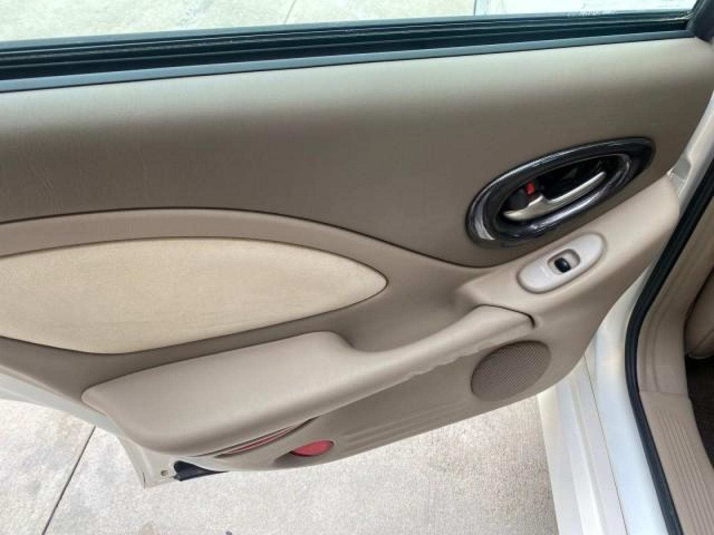 2004 White-Gold Tri Coat /Taupe Pontiac Bonneville GXP LOW MILES 43,734 V8 (1G2HZ54Y34U) with an 4.6L Northstar V8 MFI DOHC Engine engine, Automatic transmission, located at 4701 North Dixie Hwy, Pompano Beach, FL, 33064, (954) 422-2889, 26.240938, -80.123474 - OUR WEBPAGE FLORIDACARS1.COM HAS OVER 100 PHOTOS AND FREE CARFAX LINK 2004 PONTIAC BONNEVILLE GXP $ 38,335 NEW VIN: 1G2HZ54Y34U255377 1 G 2 H Z 5 4 Y 3 4 U 2 5 5 3 7 7 SEDAN 4 DR 4.6L V8 F DOHC GASOLINE FRONT WHEEL DRIVE Top Features Alloy Wheels Front Seat Heaters Head Up Display Leather and Sued - Photo#66