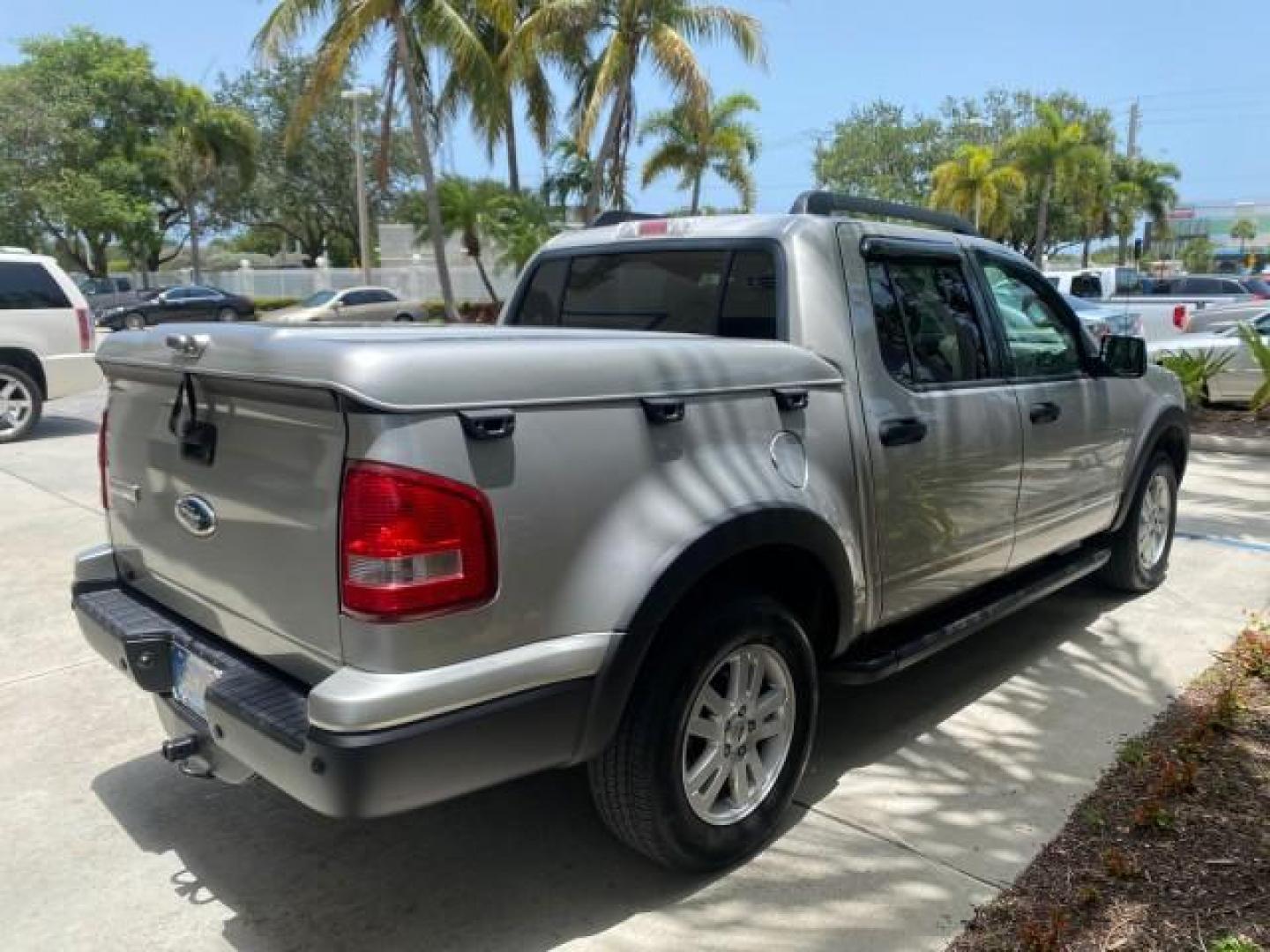 2007 Mineral Grey Metallic /Camel Ford Explorer Sport Trac XLT LOW MILES 80,420 (1FMEU31K37U) with an 4.0L SOHC 12-Valve V6 Engine engine, Automatic transmission, located at 4701 North Dixie Hwy, Pompano Beach, FL, 33064, (954) 422-2889, 26.240938, -80.123474 - OUR WEBPAGE FLORIDACARS1.COM HAS OVER 100 PHOTOS AND FREE CARFAX LINK 2007 FORD EXPLORER SPORT TRAC XLT TIRES LOOK GREAT! VIN: 1FMEU31K37UA56699 1 F M E U 3 1 K 3 7 U A 5 6 6 9 9 SPORT PICKUP 4.0L V6 F SOHC GASOLINE REAR WHEEL DRIVE Top Features Alloy Wheels Running Boards Bed Cover Tow Hitch Cloth - Photo#7