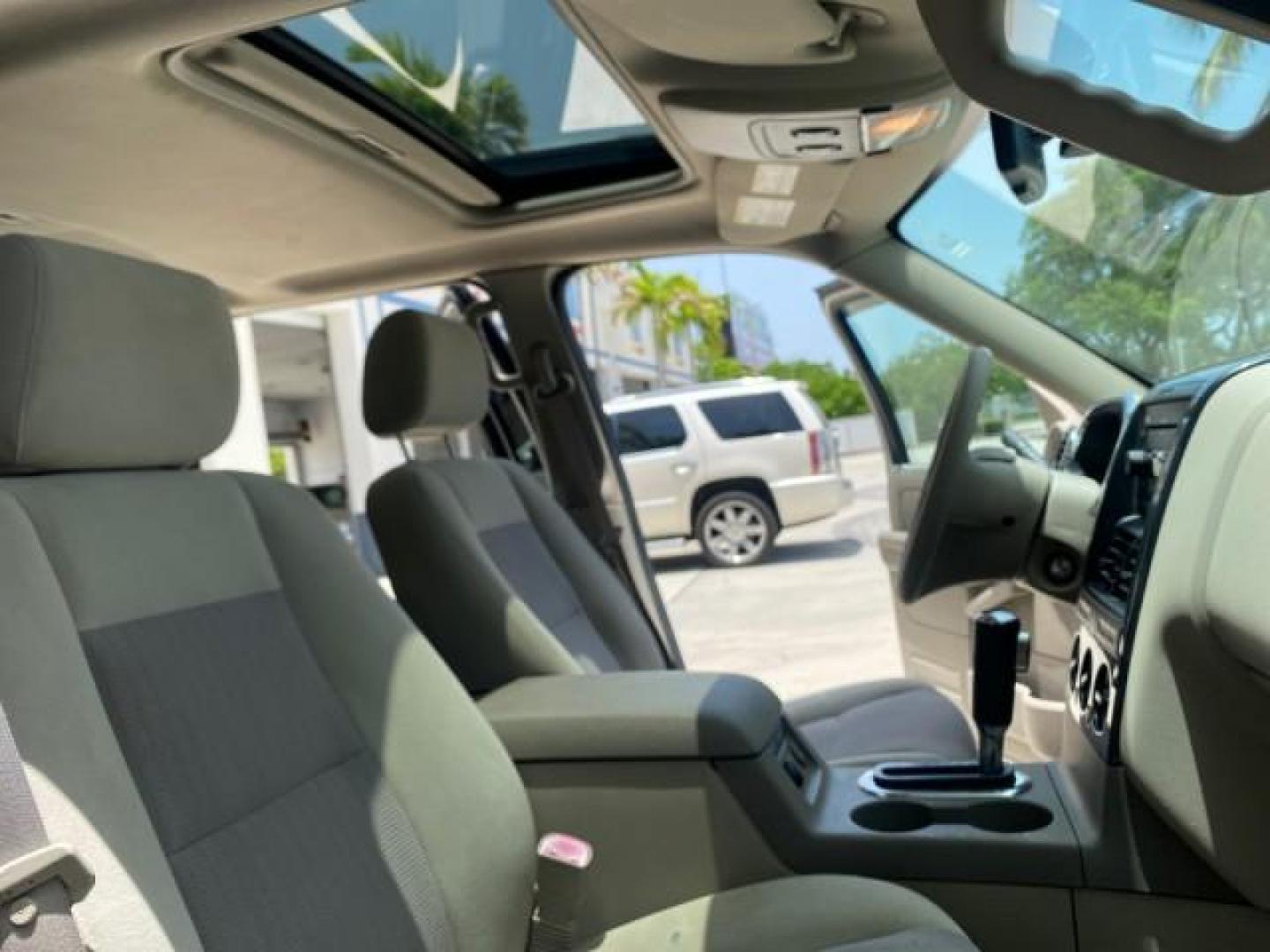 2007 Mineral Grey Metallic /Camel Ford Explorer Sport Trac XLT LOW MILES 80,420 (1FMEU31K37U) with an 4.0L SOHC 12-Valve V6 Engine engine, Automatic transmission, located at 4701 North Dixie Hwy, Pompano Beach, FL, 33064, (954) 422-2889, 26.240938, -80.123474 - OUR WEBPAGE FLORIDACARS1.COM HAS OVER 100 PHOTOS AND FREE CARFAX LINK 2007 FORD EXPLORER SPORT TRAC XLT TIRES LOOK GREAT! VIN: 1FMEU31K37UA56699 1 F M E U 3 1 K 3 7 U A 5 6 6 9 9 SPORT PICKUP 4.0L V6 F SOHC GASOLINE REAR WHEEL DRIVE Top Features Alloy Wheels Running Boards Bed Cover Tow Hitch Cloth - Photo#12